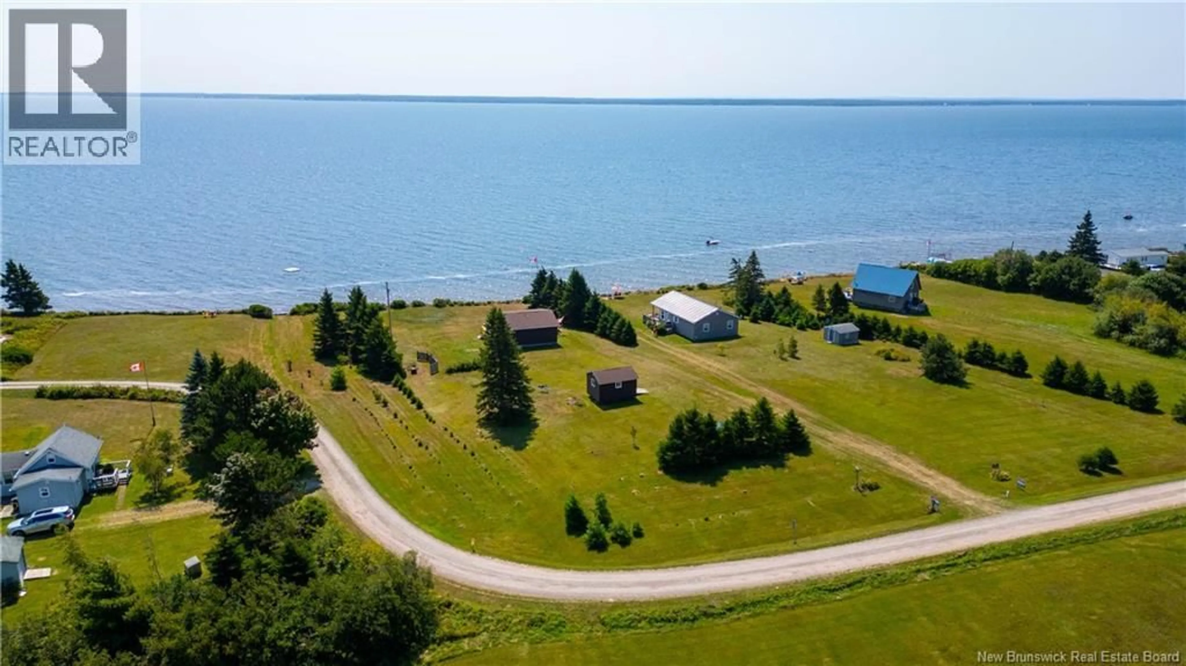 A pic from outside/outdoor area/front of a property/back of a property/a pic from drone, water/lake/river/ocean view for 80 MONASH LANE, Cape Spear New Brunswick E4M2R9