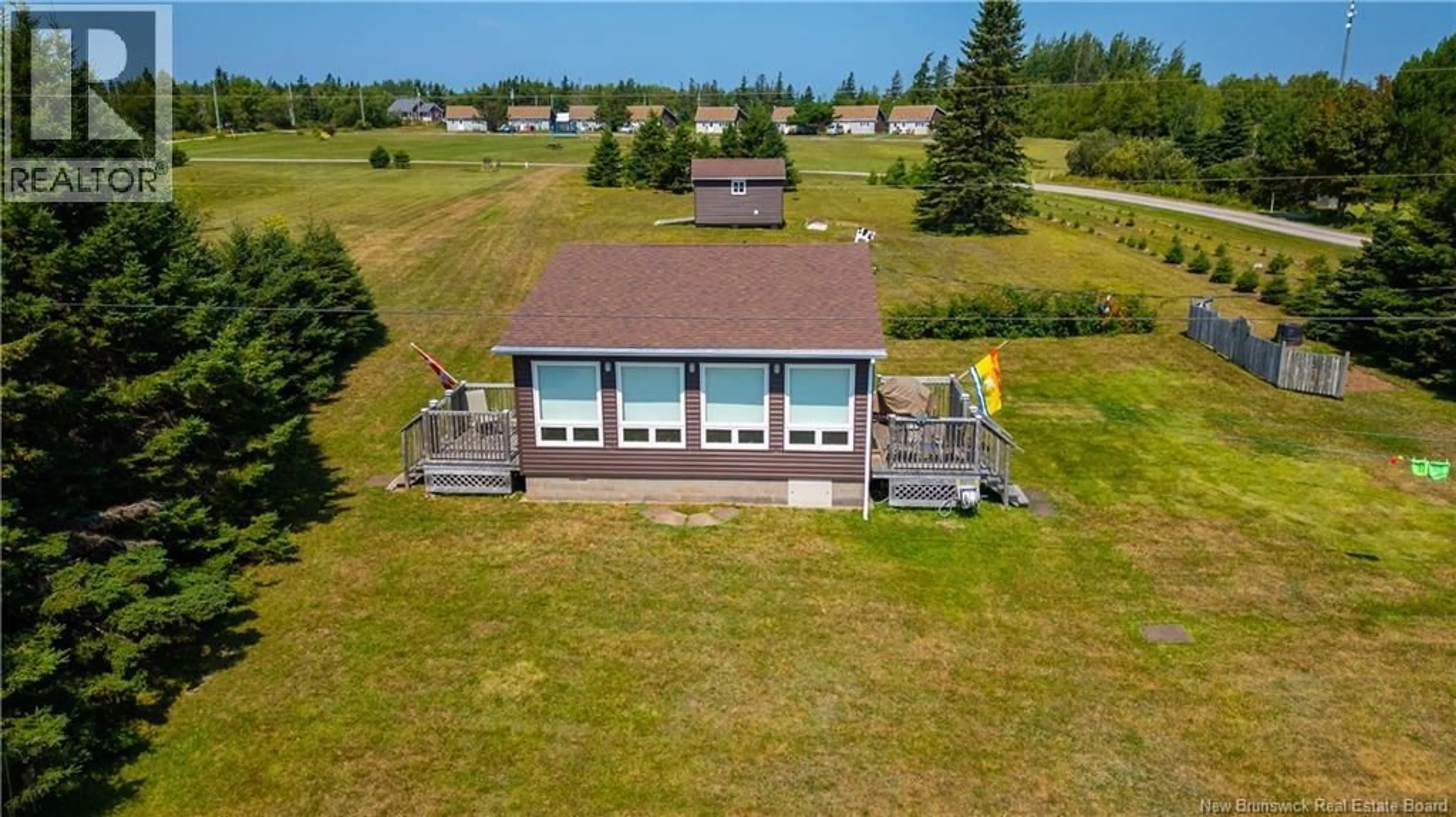 A pic from outside/outdoor area/front of a property/back of a property/a pic from drone, water/lake/river/ocean view for 80 MONASH LANE, Cape Spear New Brunswick E4M2R9