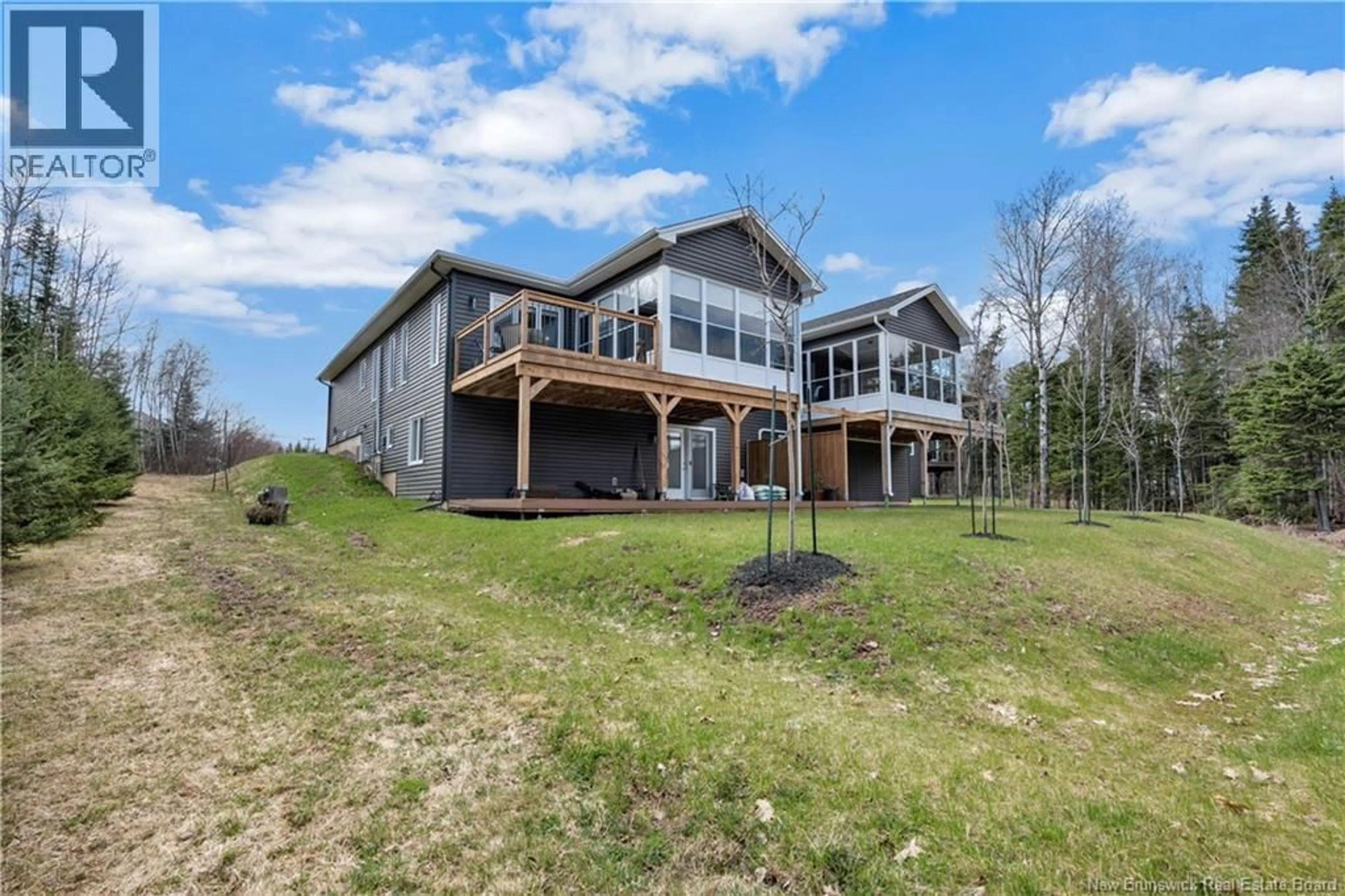 A pic from outside/outdoor area/front of a property/back of a property/a pic from drone, water/lake/river/ocean view for 310 DAMIEN, Dieppe New Brunswick E1A5V6