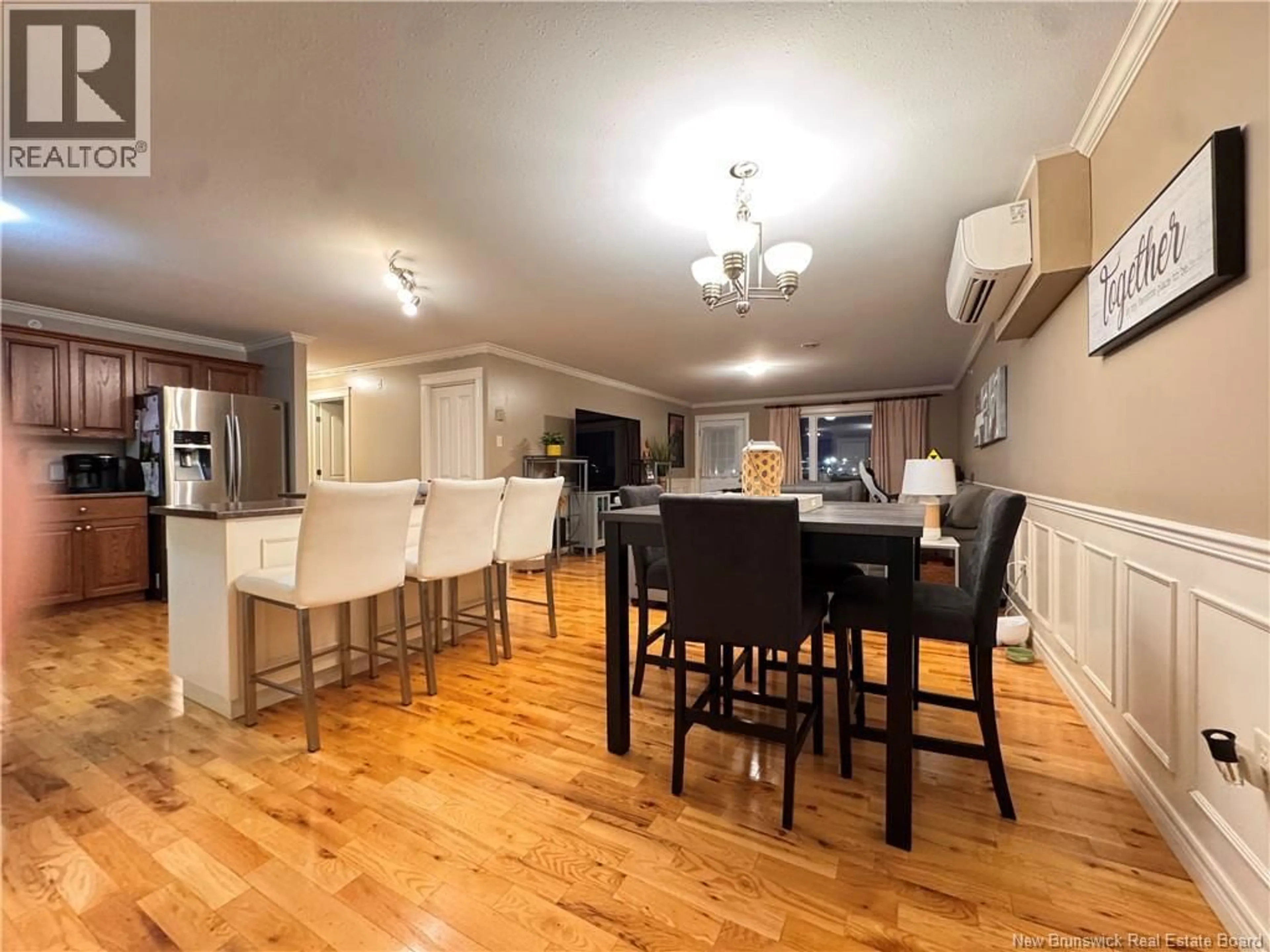 Open concept kitchen, wood/laminate floor for 442 - 225 SERENITY LANE, Fredericton New Brunswick E3B0H1