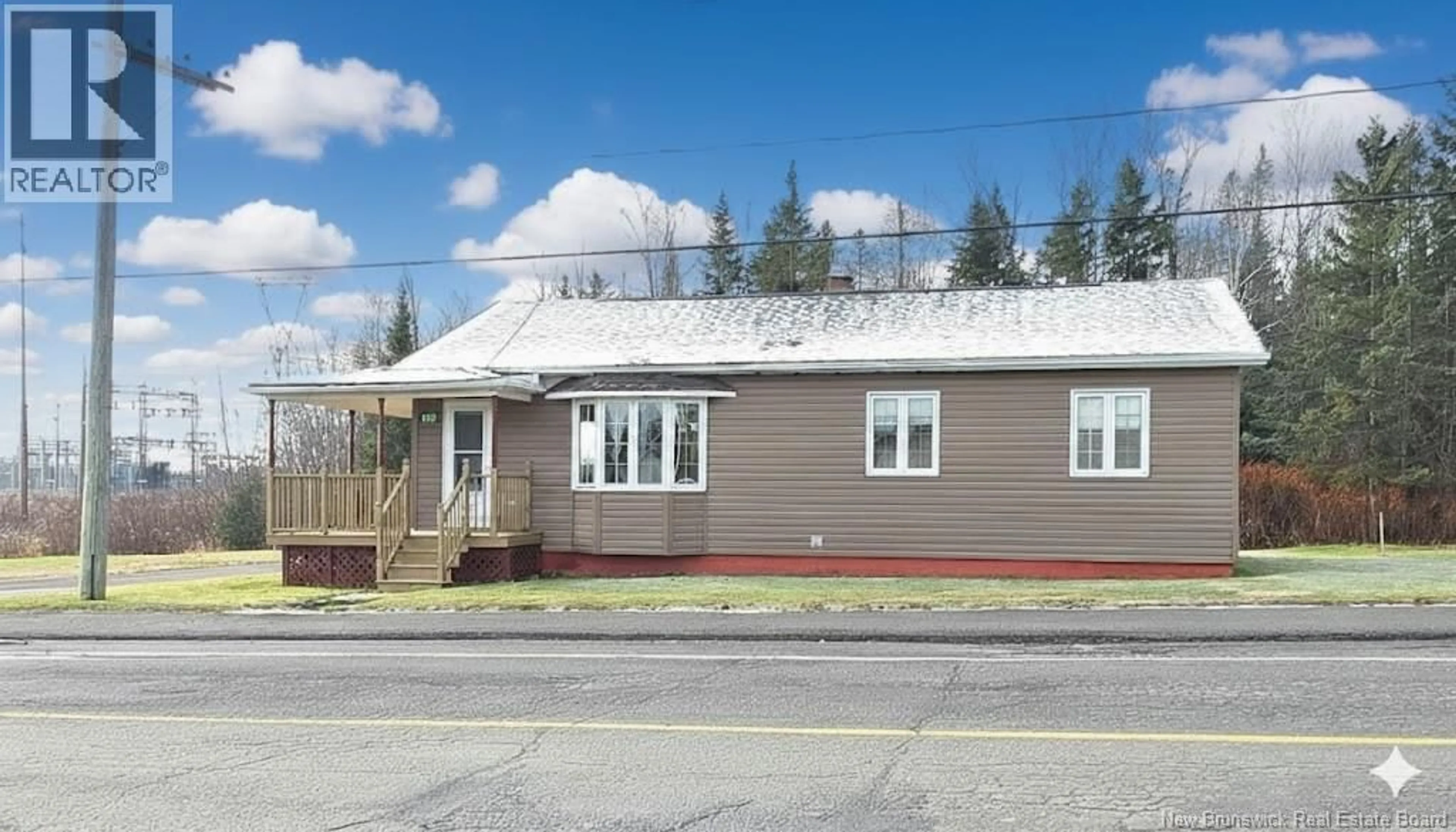 Home with vinyl exterior material, street for 106 WEST RIVER RD, Grand Falls New Brunswick E3Z1R6