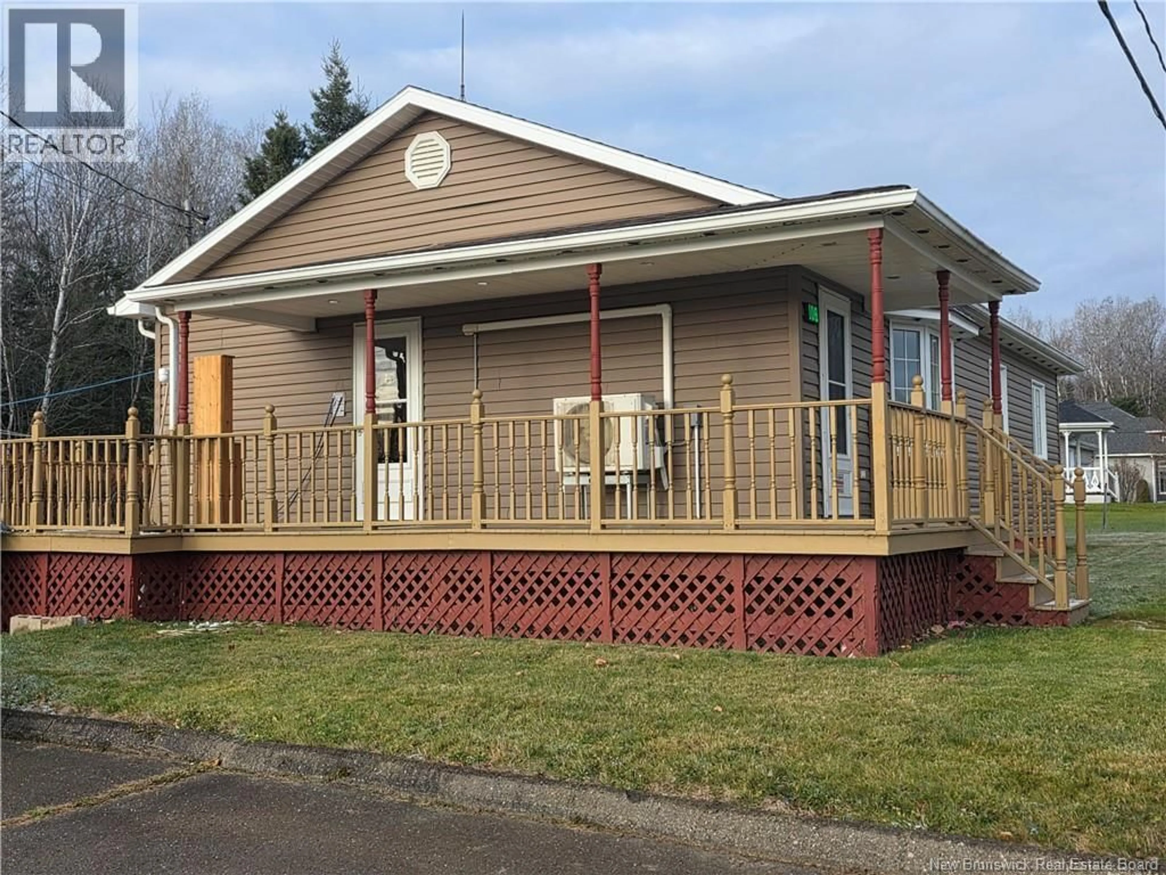 Home with vinyl exterior material, street for 106 WEST RIVER RD, Grand Falls New Brunswick E3Z1R6