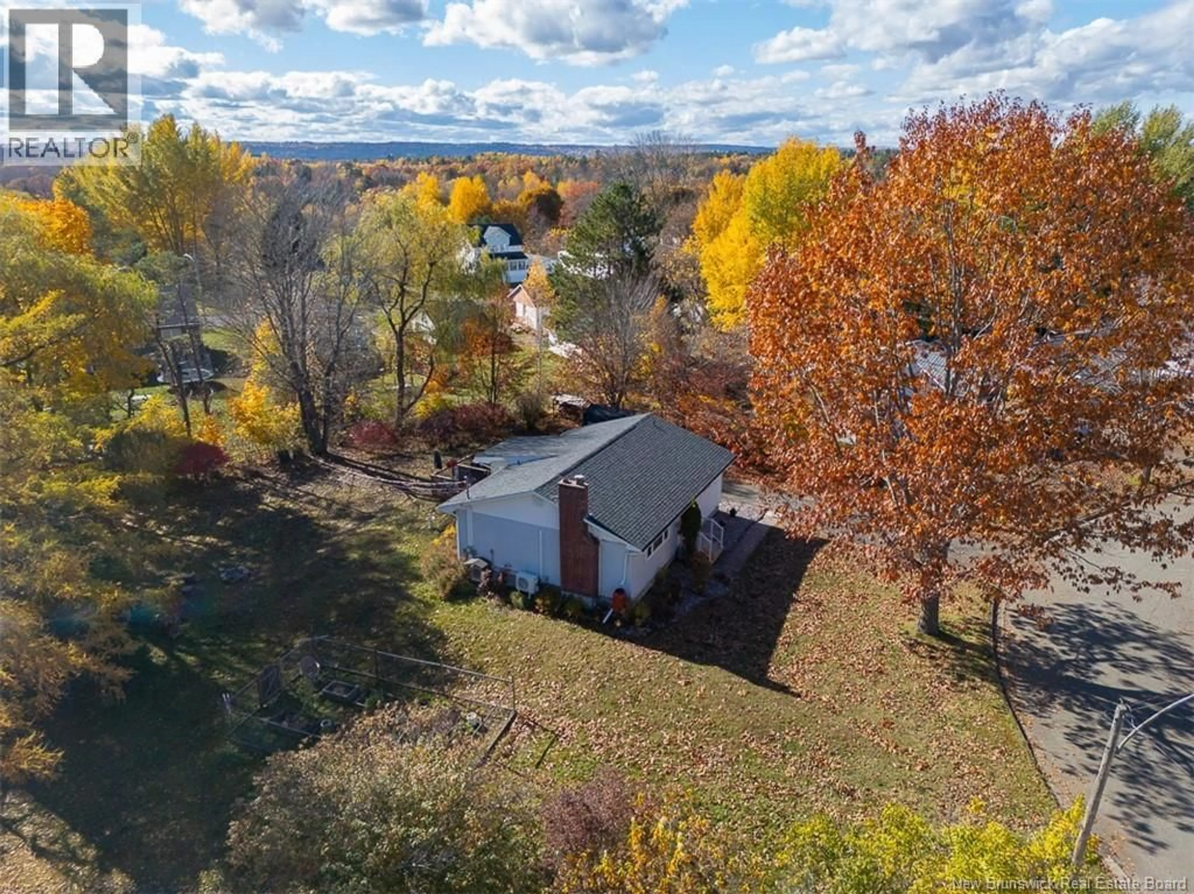 A pic from outside/outdoor area/front of a property/back of a property/a pic from drone, unknown for 16 CORONATION COURT, Fredericton New Brunswick E3A4K4