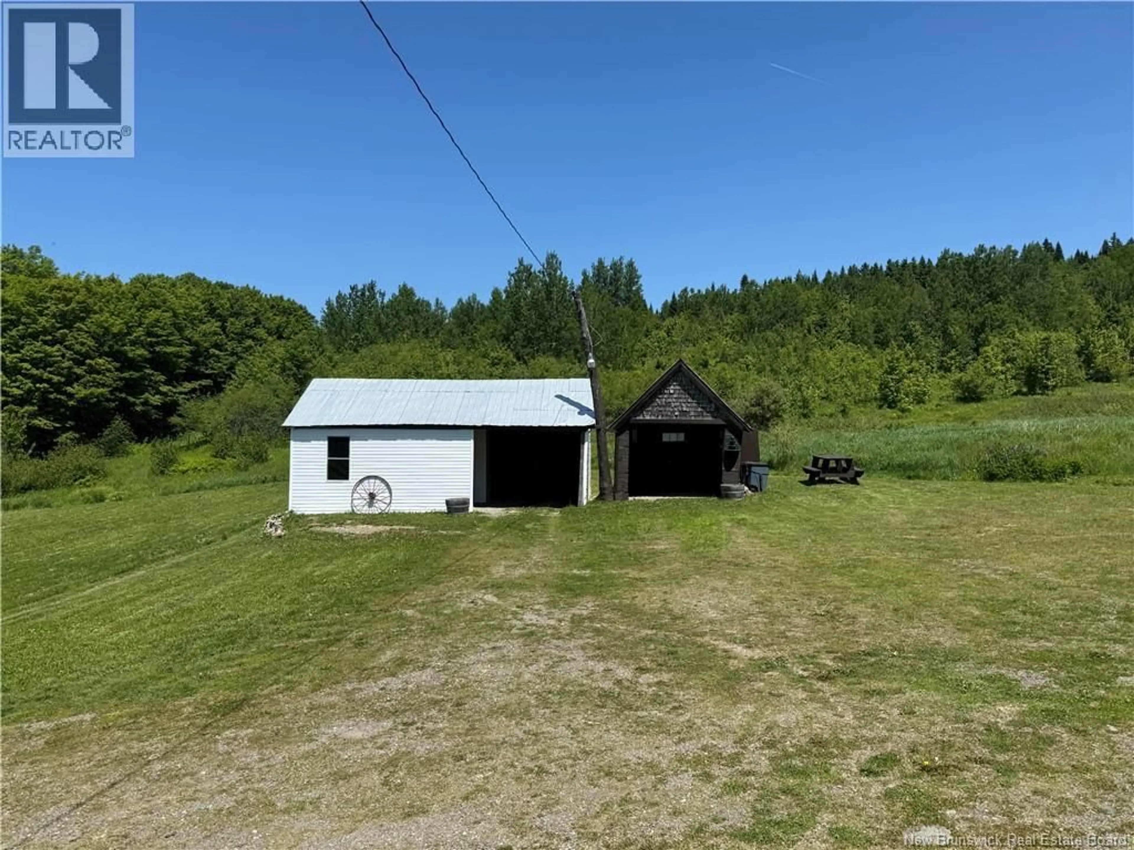 A pic from outside/outdoor area/front of a property/back of a property/a pic from drone, building for 389 KNOWLESVILLE ROAD, Knowlesville New Brunswick E7L1M5