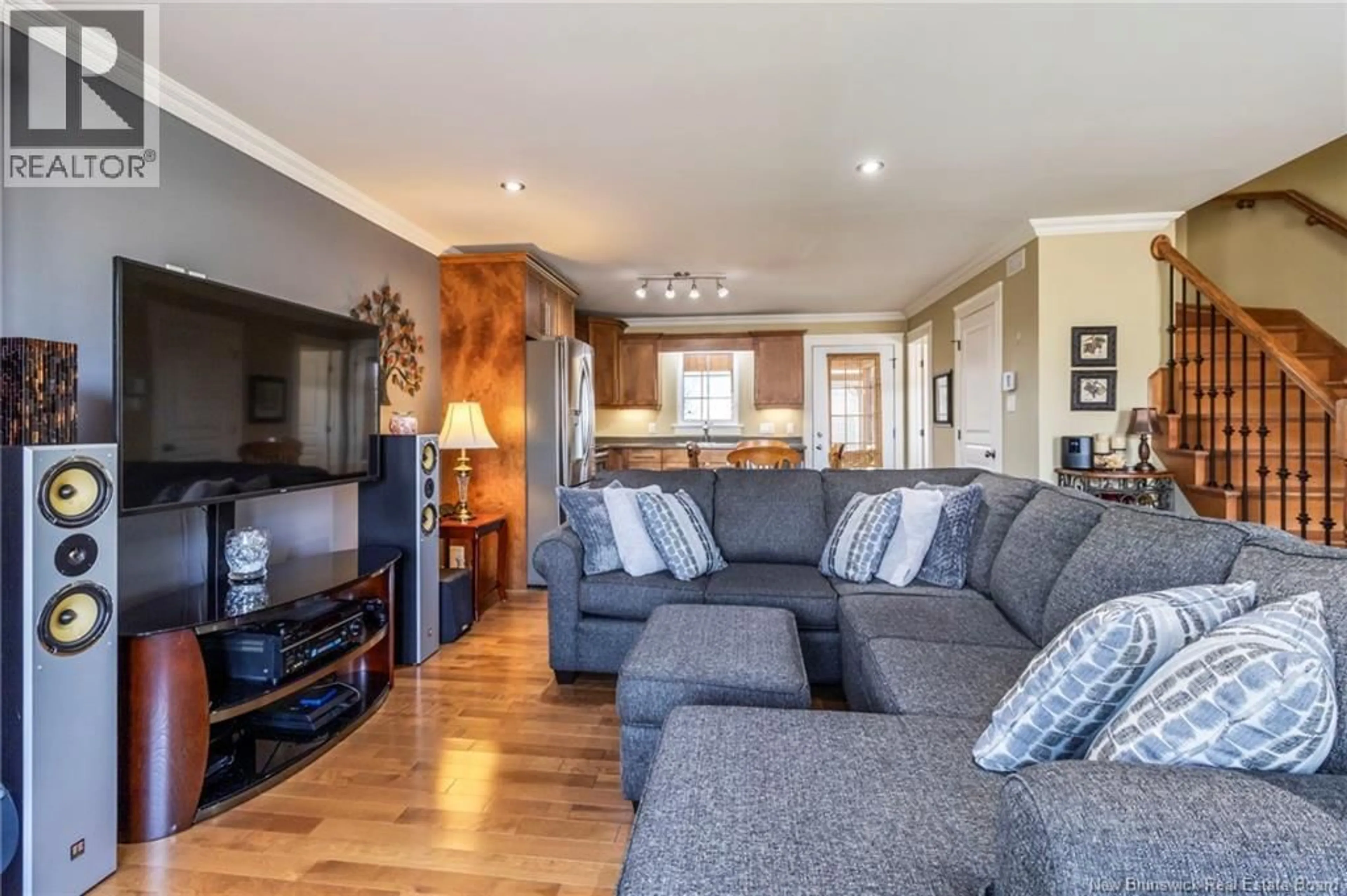 Living room with furniture, wood/laminate floor for 71 LAKEBURN AVENUE, Dieppe New Brunswick E1A0Y8