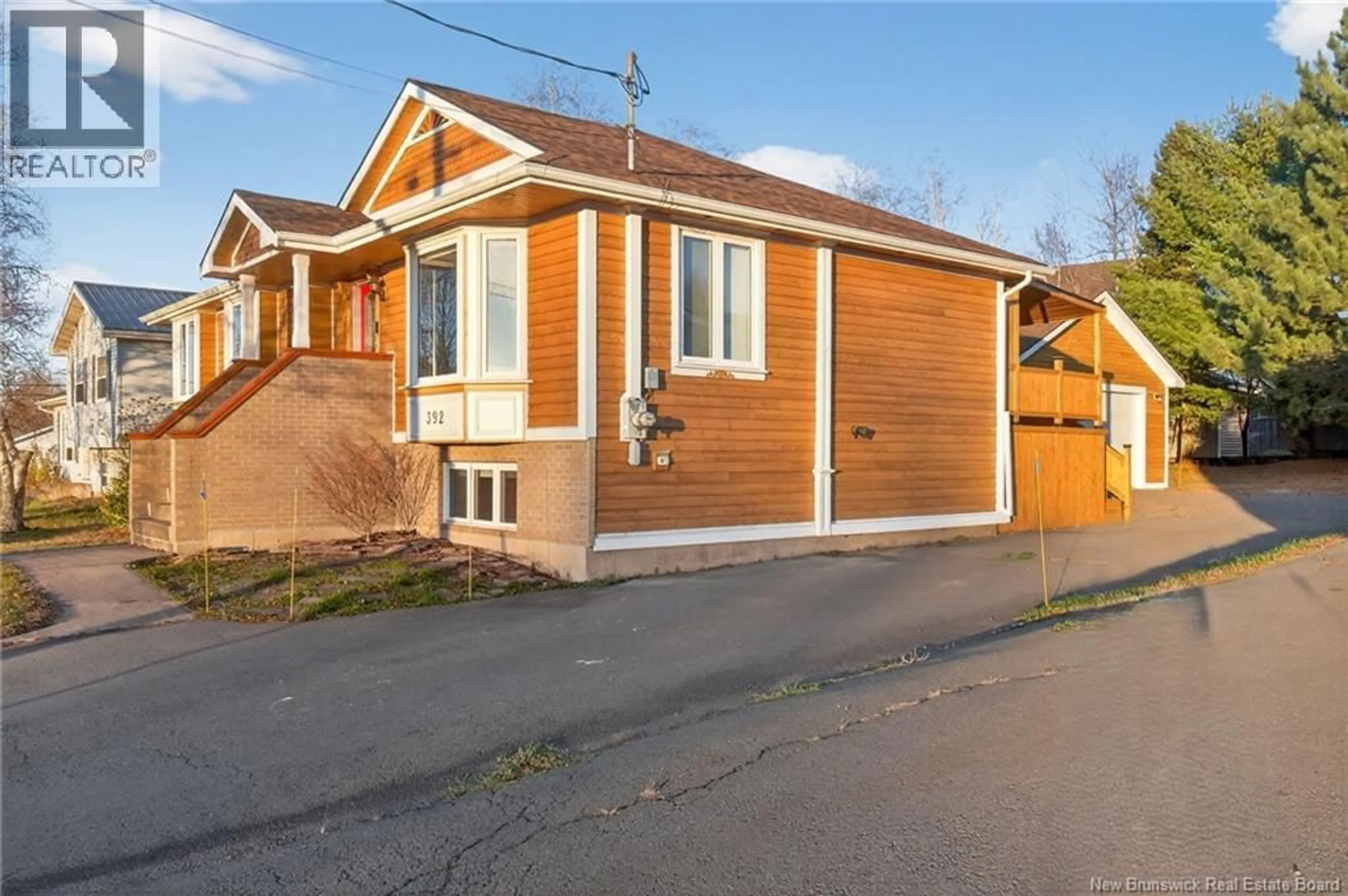 Home with vinyl exterior material, street for 392 FOX CREEK, Dieppe New Brunswick E1A7M7