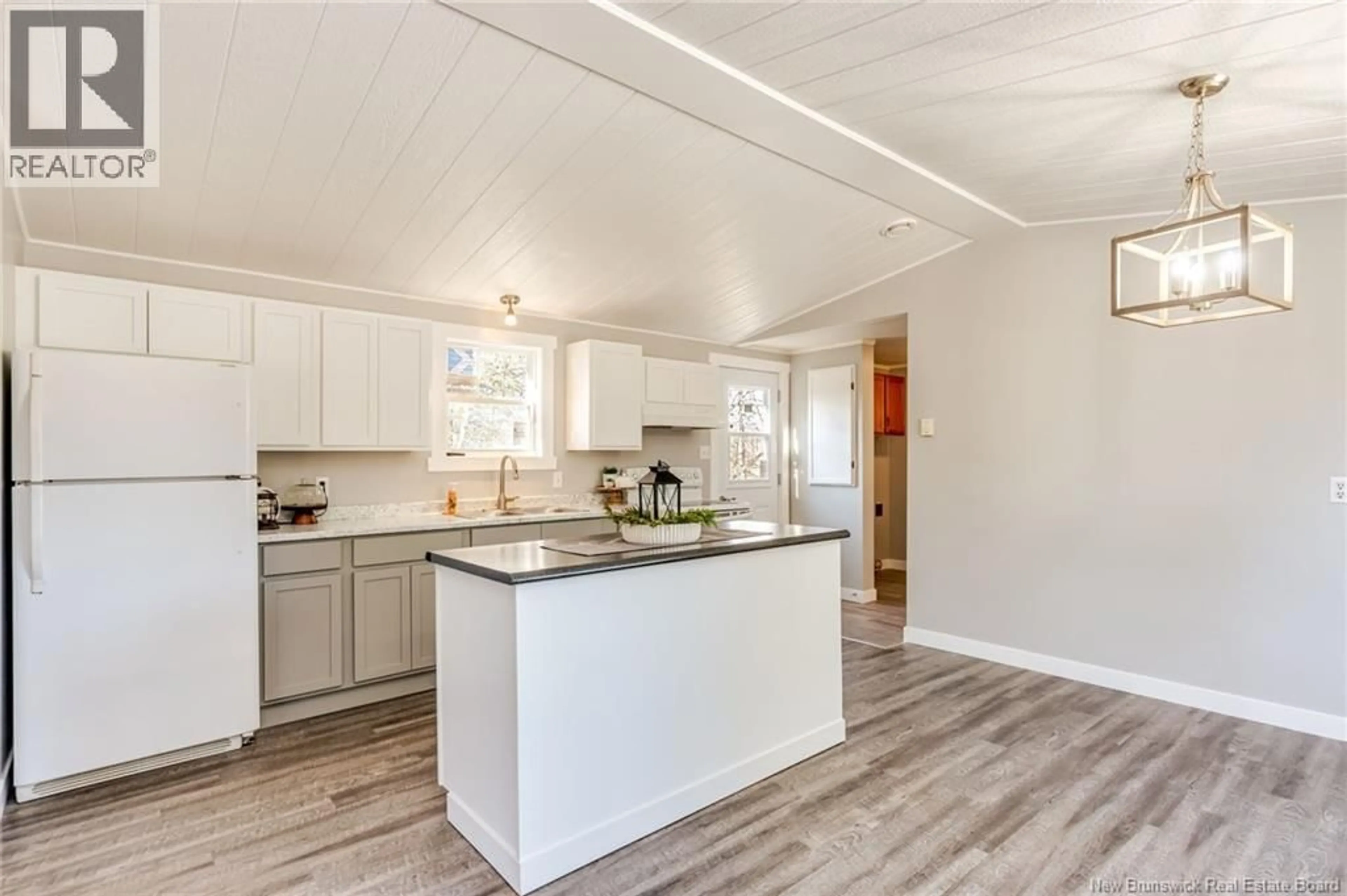 Open concept kitchen, wood/laminate floor for 87 RIVER ROAD, Passekeag New Brunswick E5N7N1