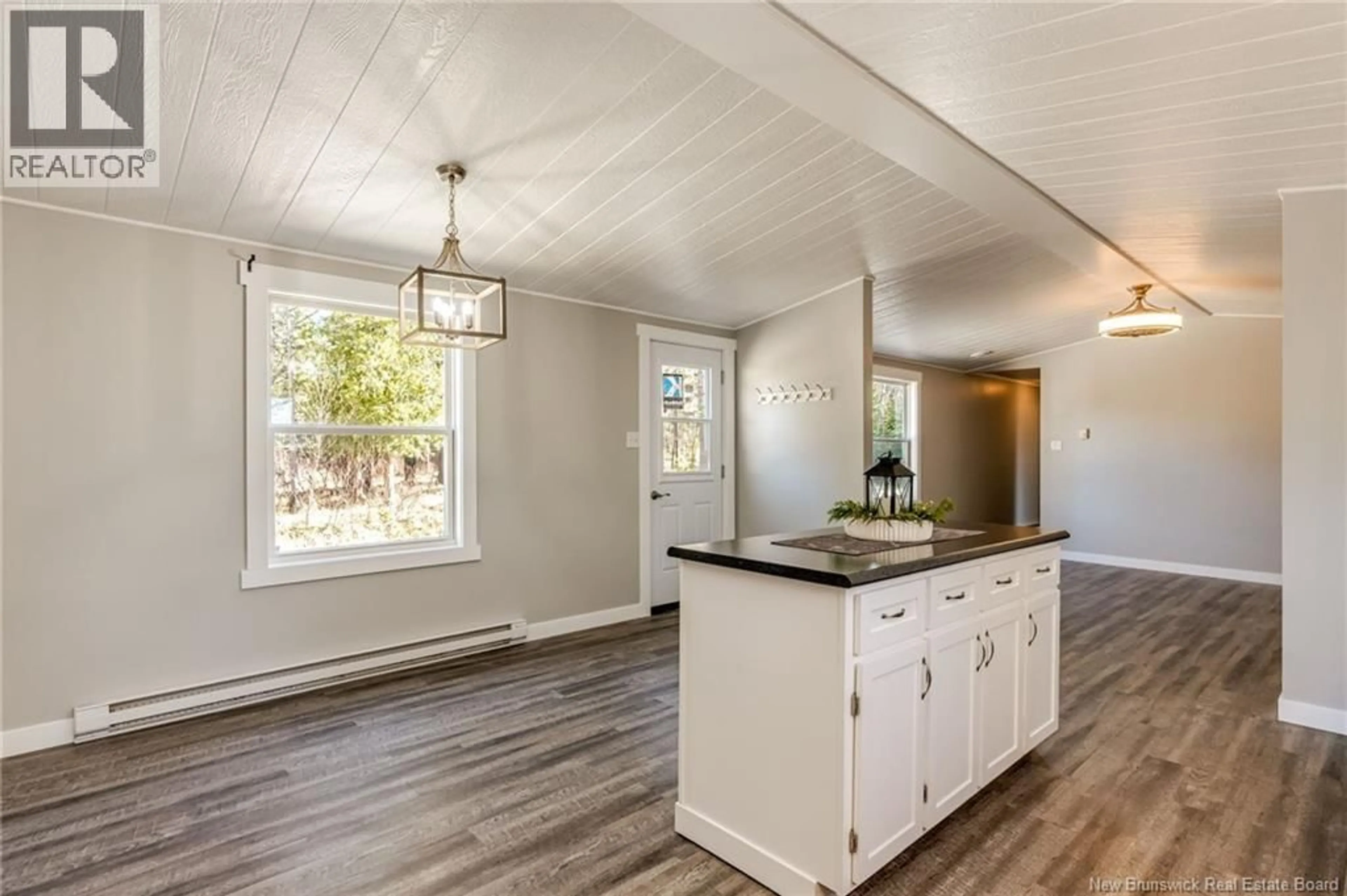 Open concept kitchen, wood/laminate floor for 87 RIVER ROAD, Passekeag New Brunswick E5N7N1