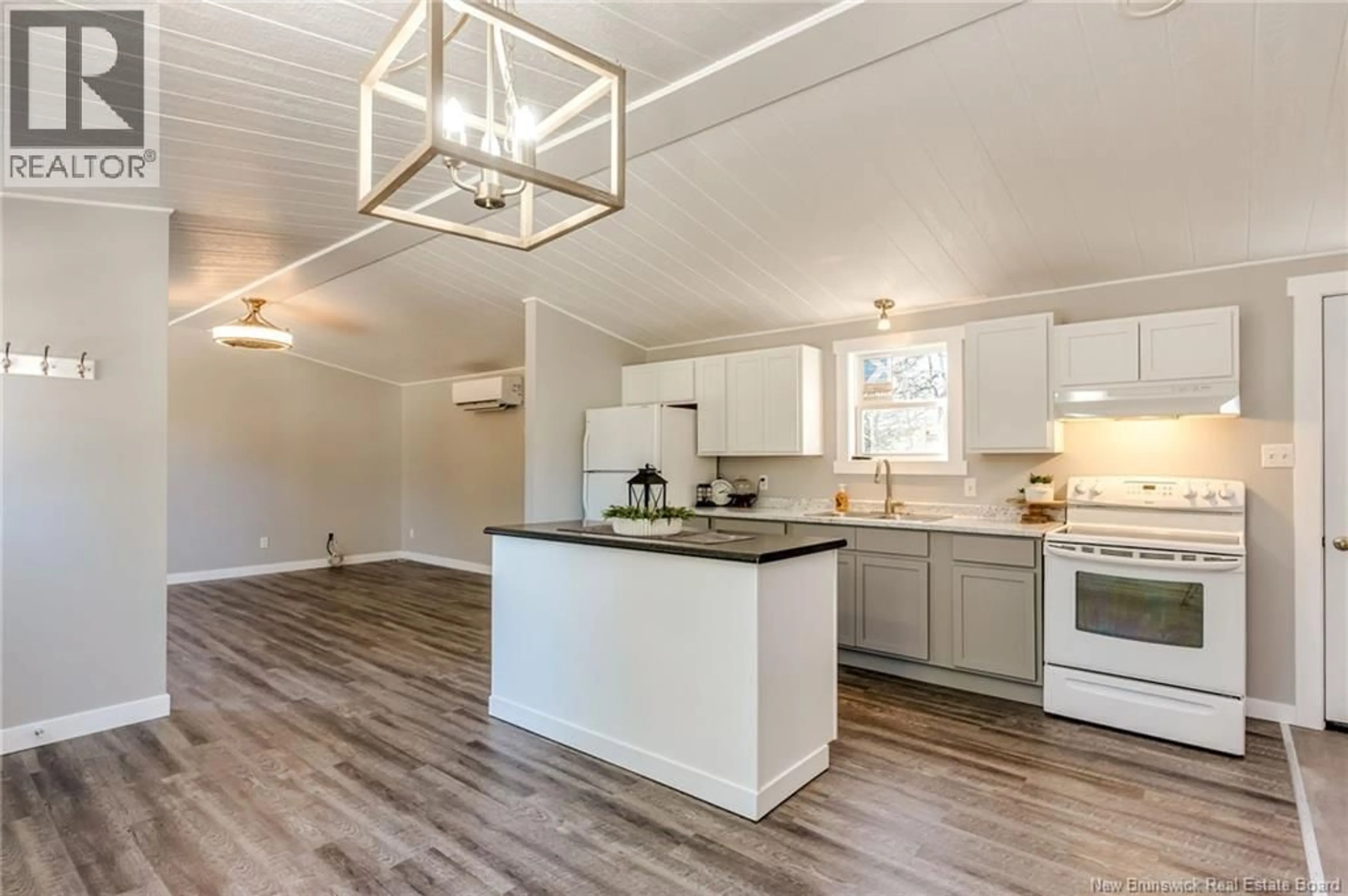 Open concept kitchen, wood/laminate floor for 87 RIVER ROAD, Passekeag New Brunswick E5N7N1