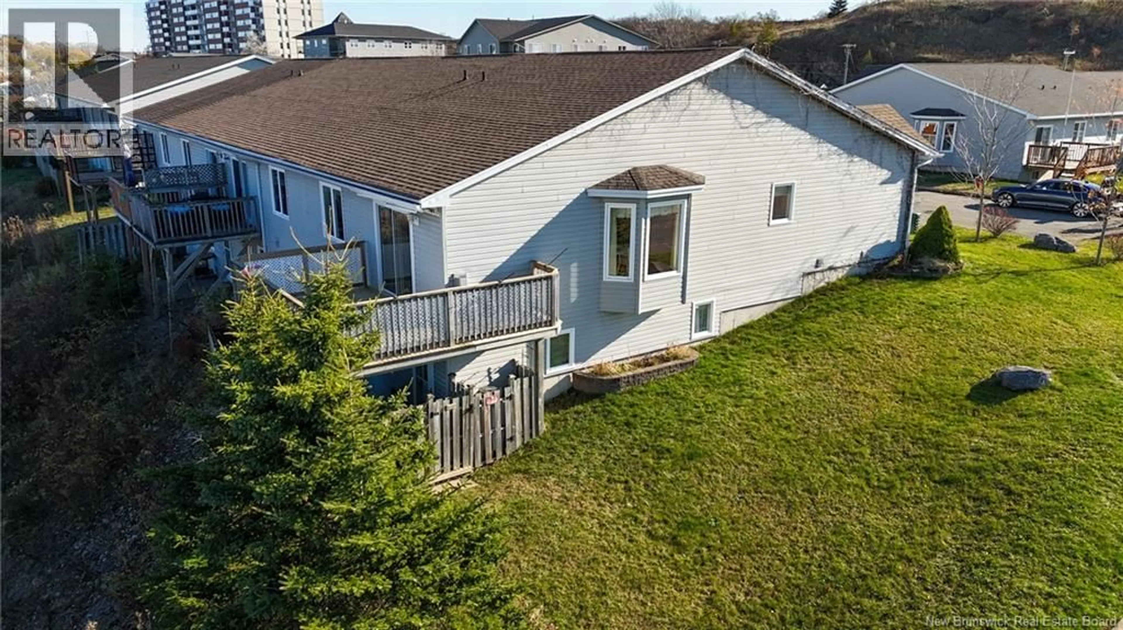 A pic from outside/outdoor area/front of a property/back of a property/a pic from drone, unknown for 15 SAINT PETERS COURT, Saint John New Brunswick E2K5N4