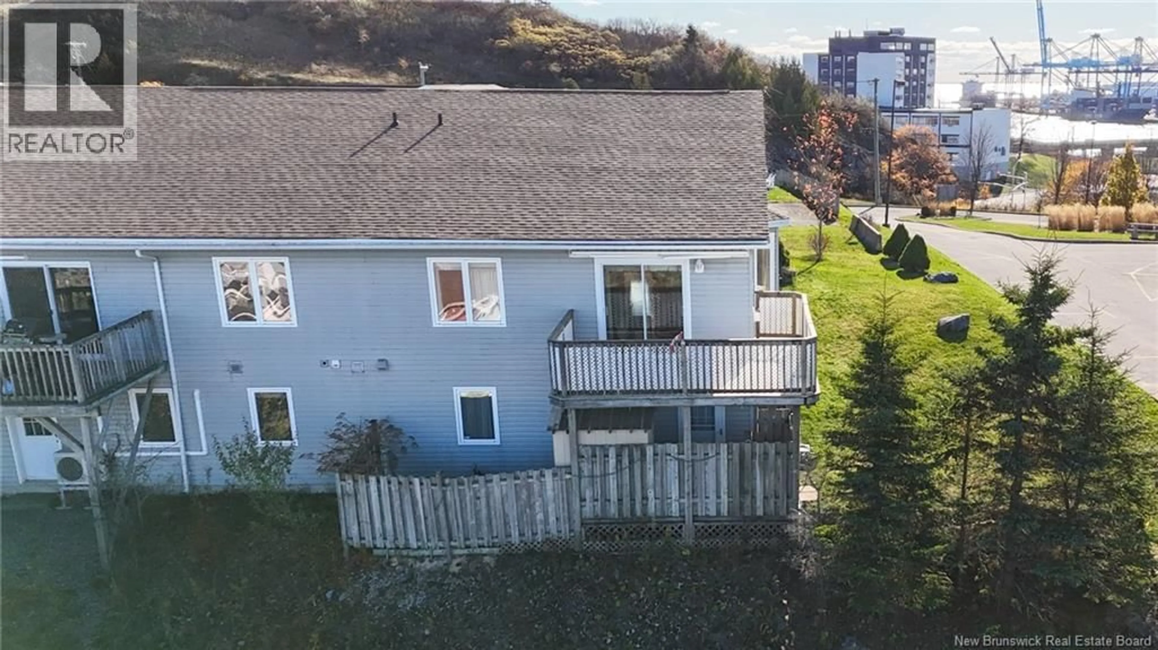 A pic from outside/outdoor area/front of a property/back of a property/a pic from drone, unknown for 15 SAINT PETERS COURT, Saint John New Brunswick E2K5N4
