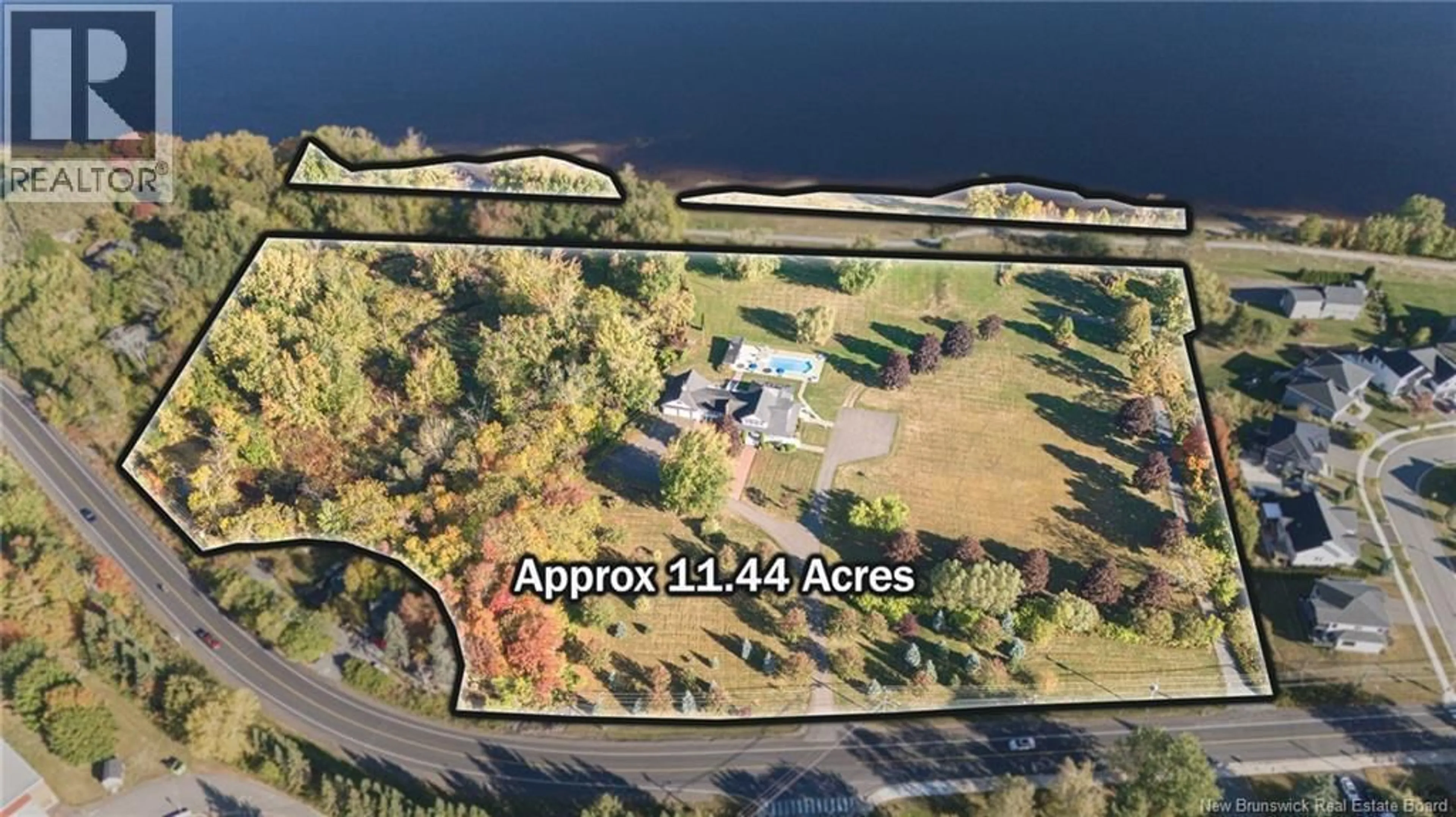 A pic from outside/outdoor area/front of a property/back of a property/a pic from drone, water/lake/river/ocean view for 1337 WOODSTOCK ROAD, Fredericton New Brunswick E3B7R9