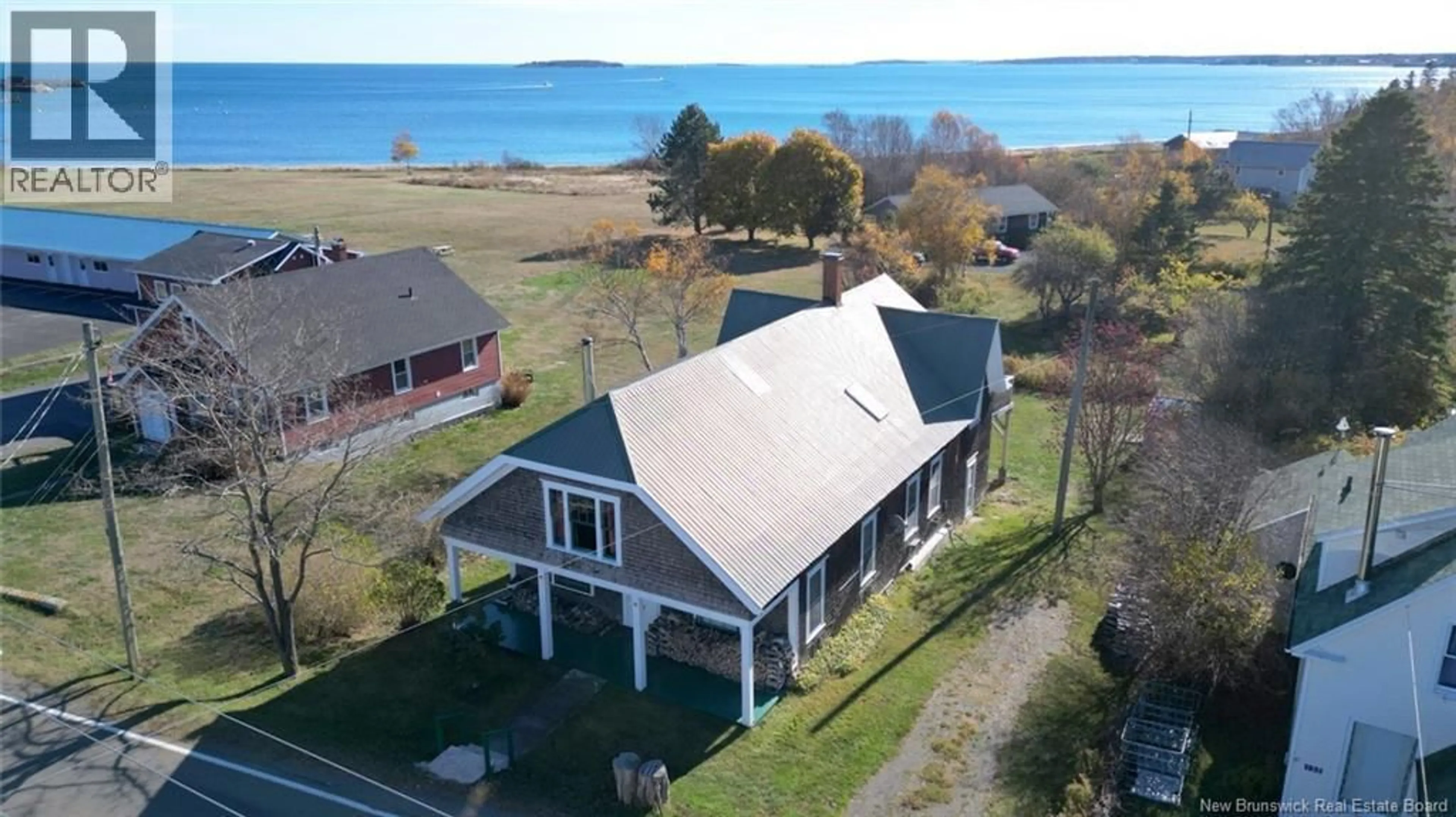A pic from outside/outdoor area/front of a property/back of a property/a pic from drone, water/lake/river/ocean view for 131 ROUTE 776, Grand Manan New Brunswick E5G1A4