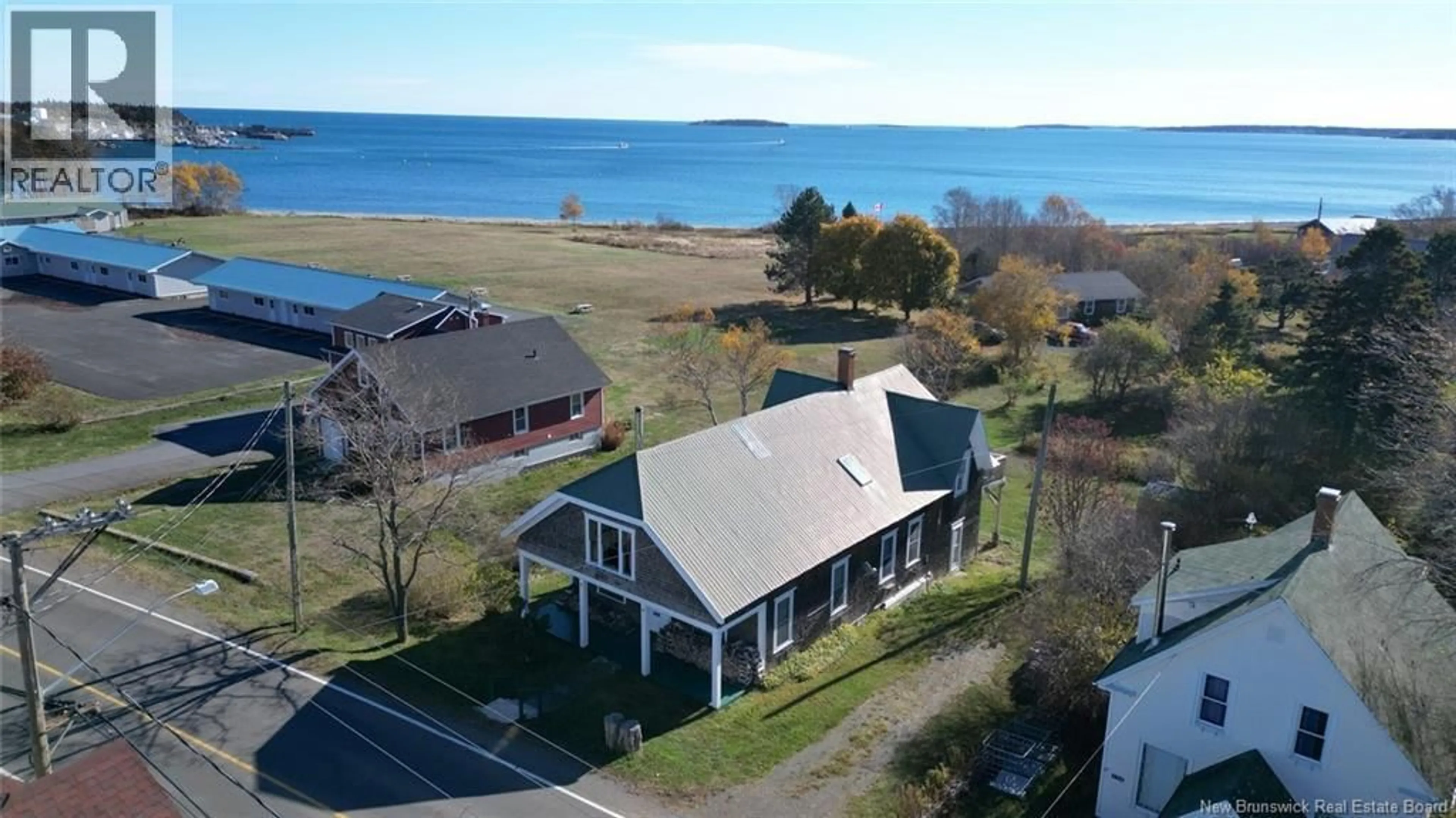A pic from outside/outdoor area/front of a property/back of a property/a pic from drone, water/lake/river/ocean view for 131 ROUTE 776, Grand Manan New Brunswick E5G1A4