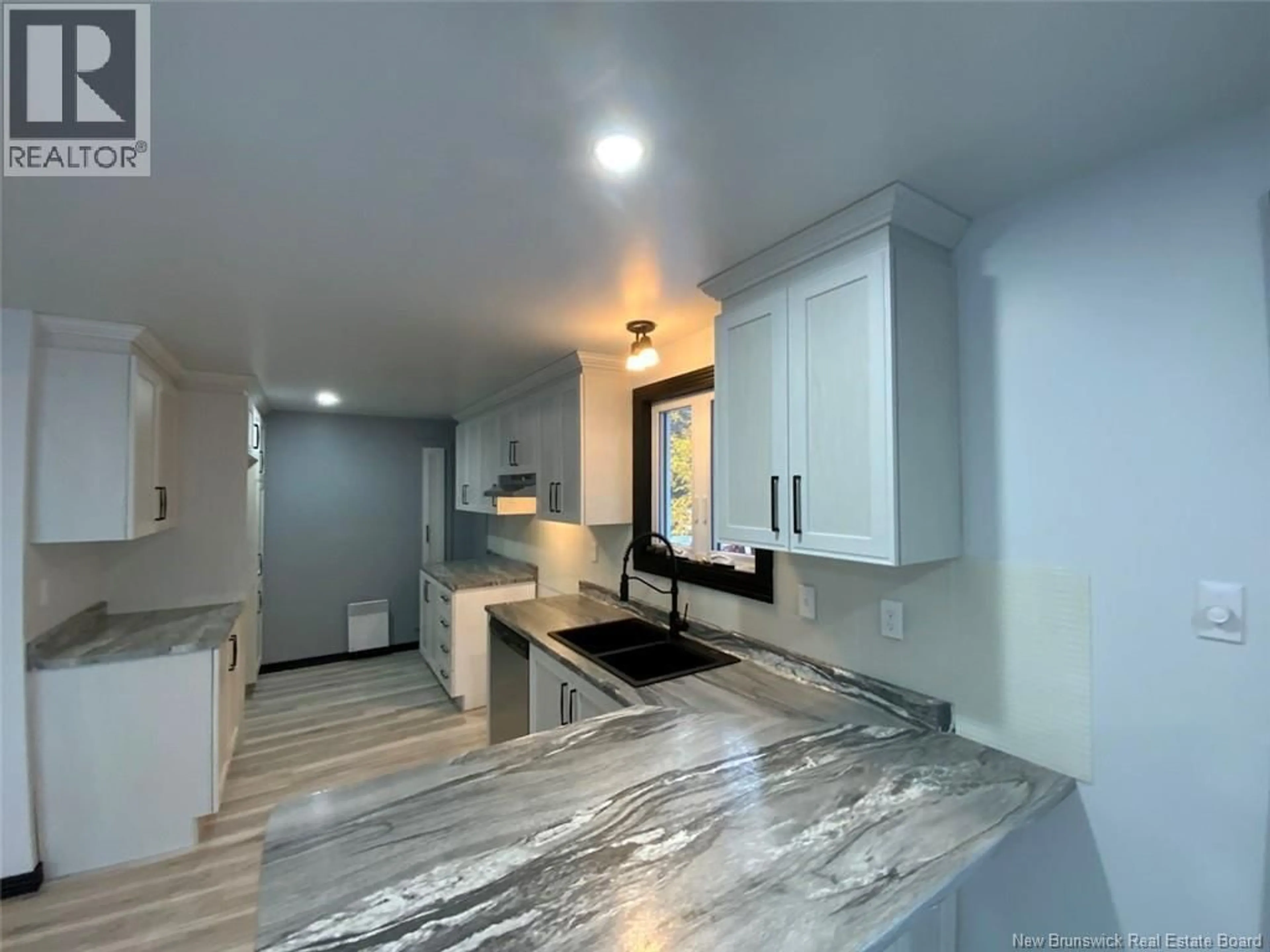 Open concept kitchen, ceramic/tile floor for 14 ST-ONGE STREET, Saint-Jacques New Brunswick E7B1V7