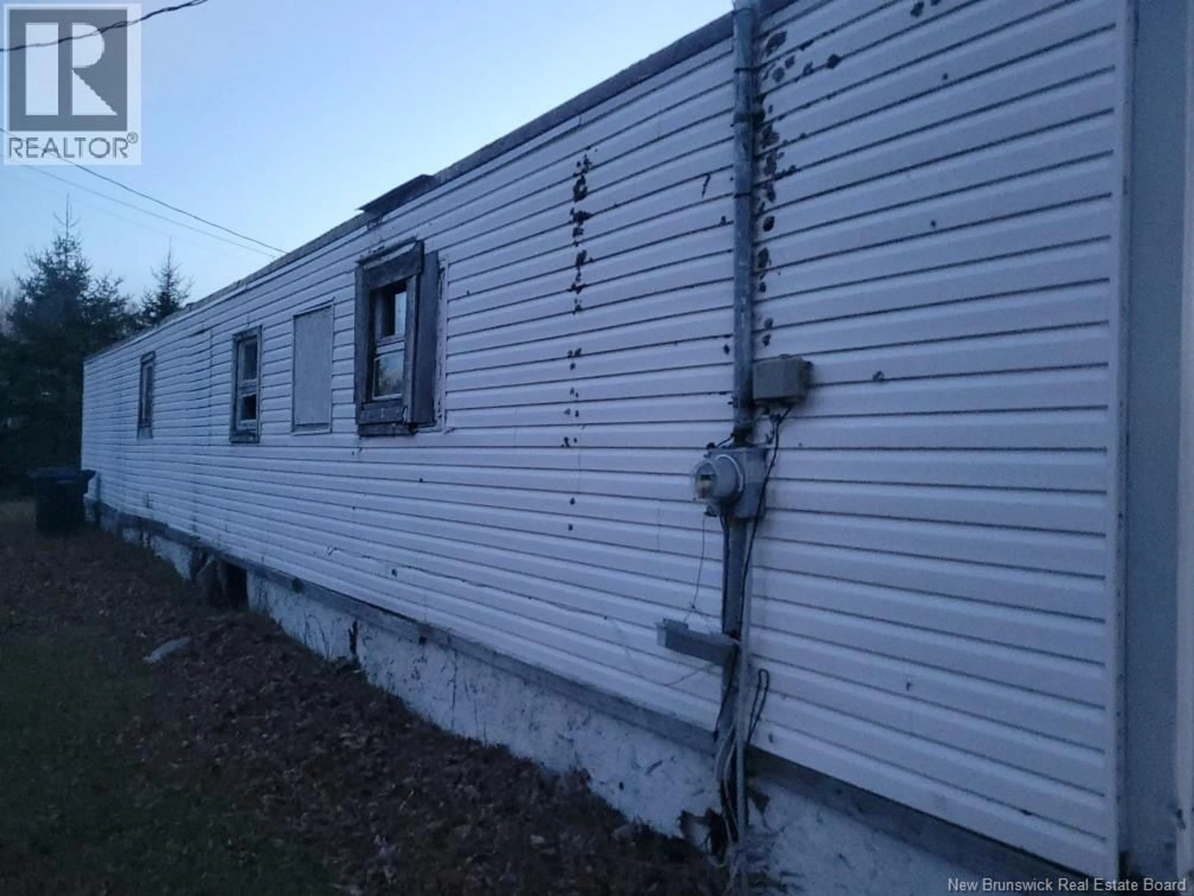 Home with vinyl exterior material, building for 12002 ROUTE 11, Village-Blanchard New Brunswick E8P1R7