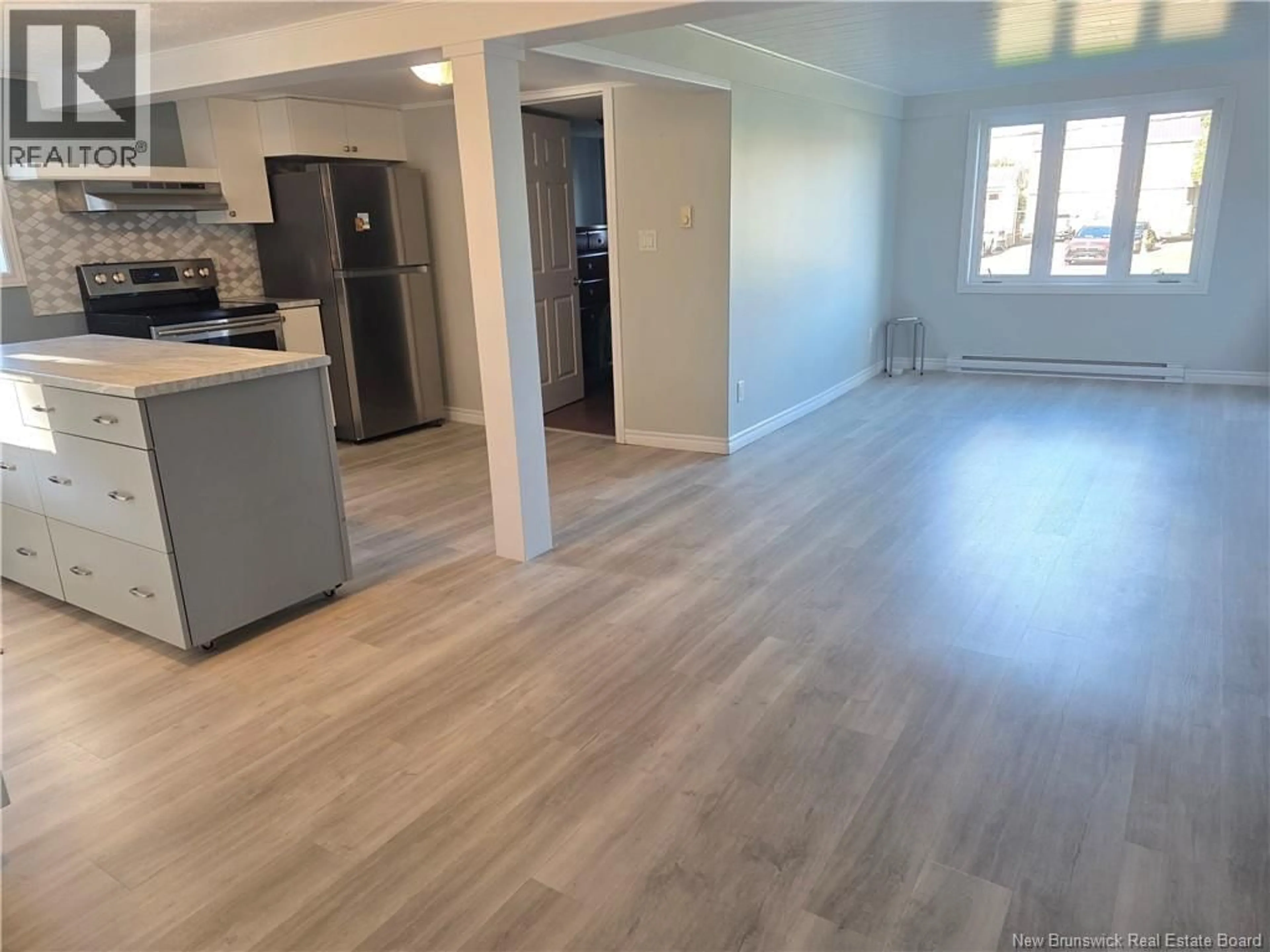 Open concept kitchen, wood/laminate floor for 4736 RTE 134, Cocagne New Brunswick E4R2Z7