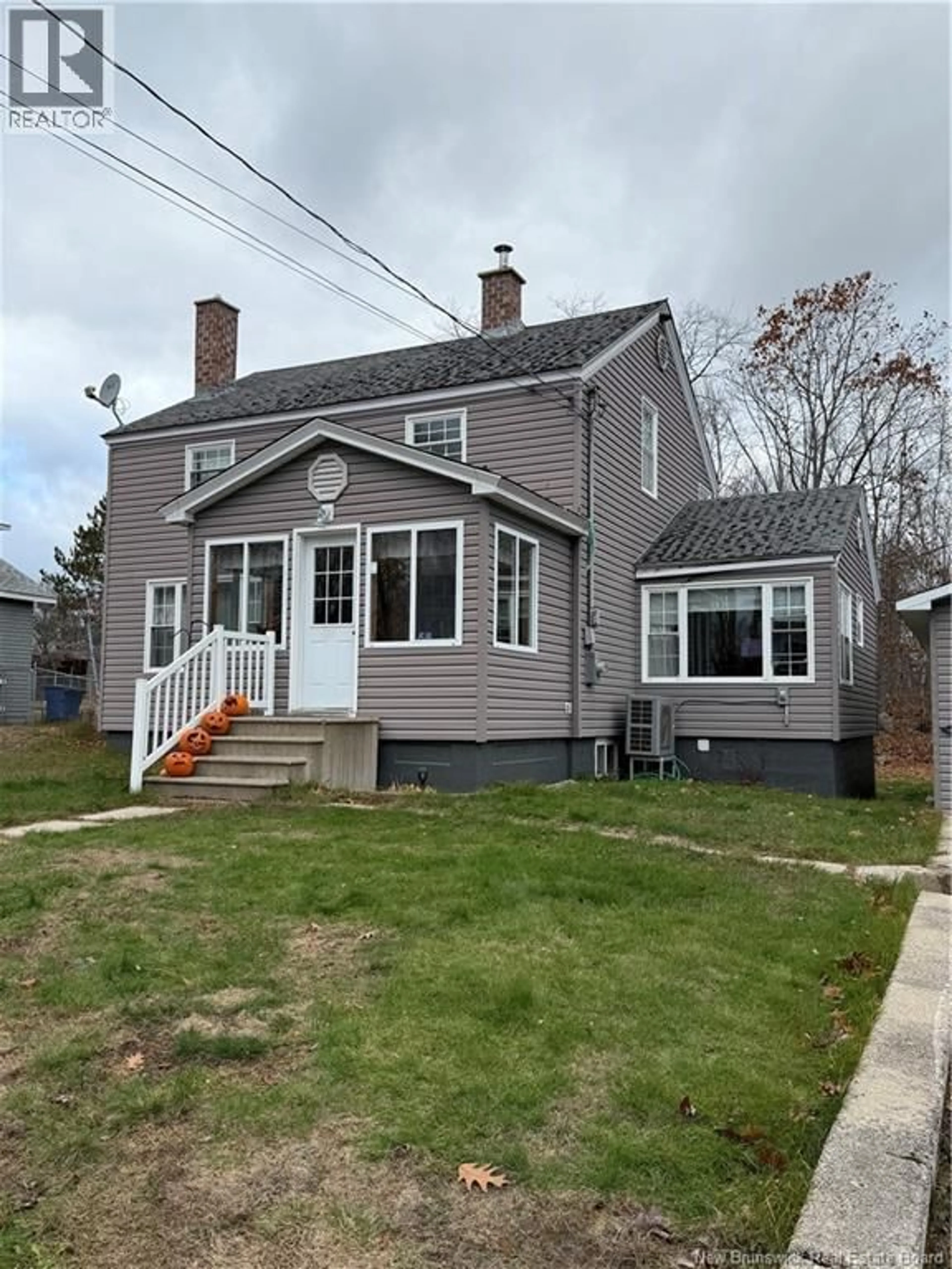 Home with vinyl exterior material, street for 58 OAK STREET, McAdam New Brunswick E6J1M6