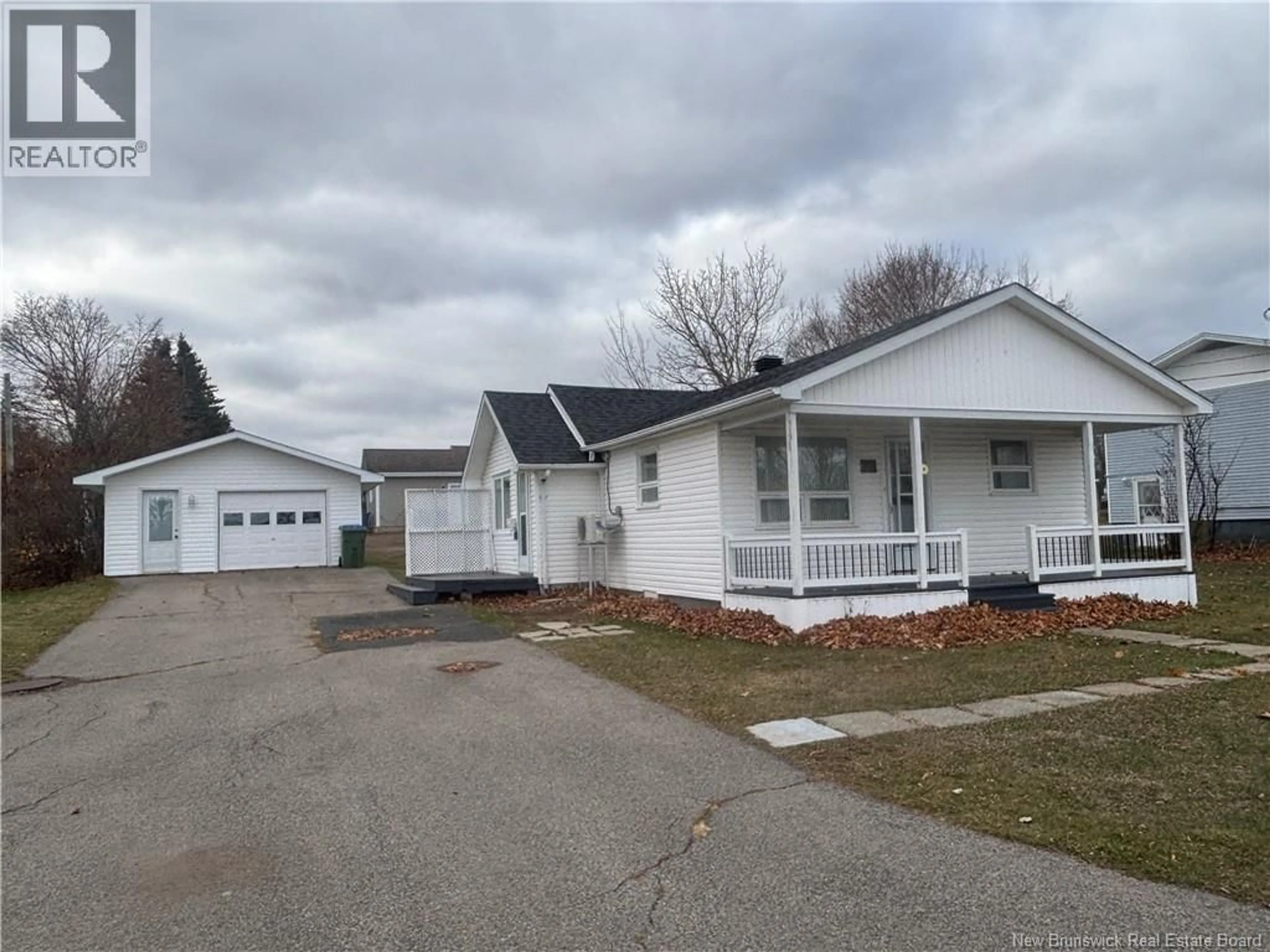 Home with vinyl exterior material, street for 22 PROMENADE FLORIENT, Petit-Rocher New Brunswick E8J1S3