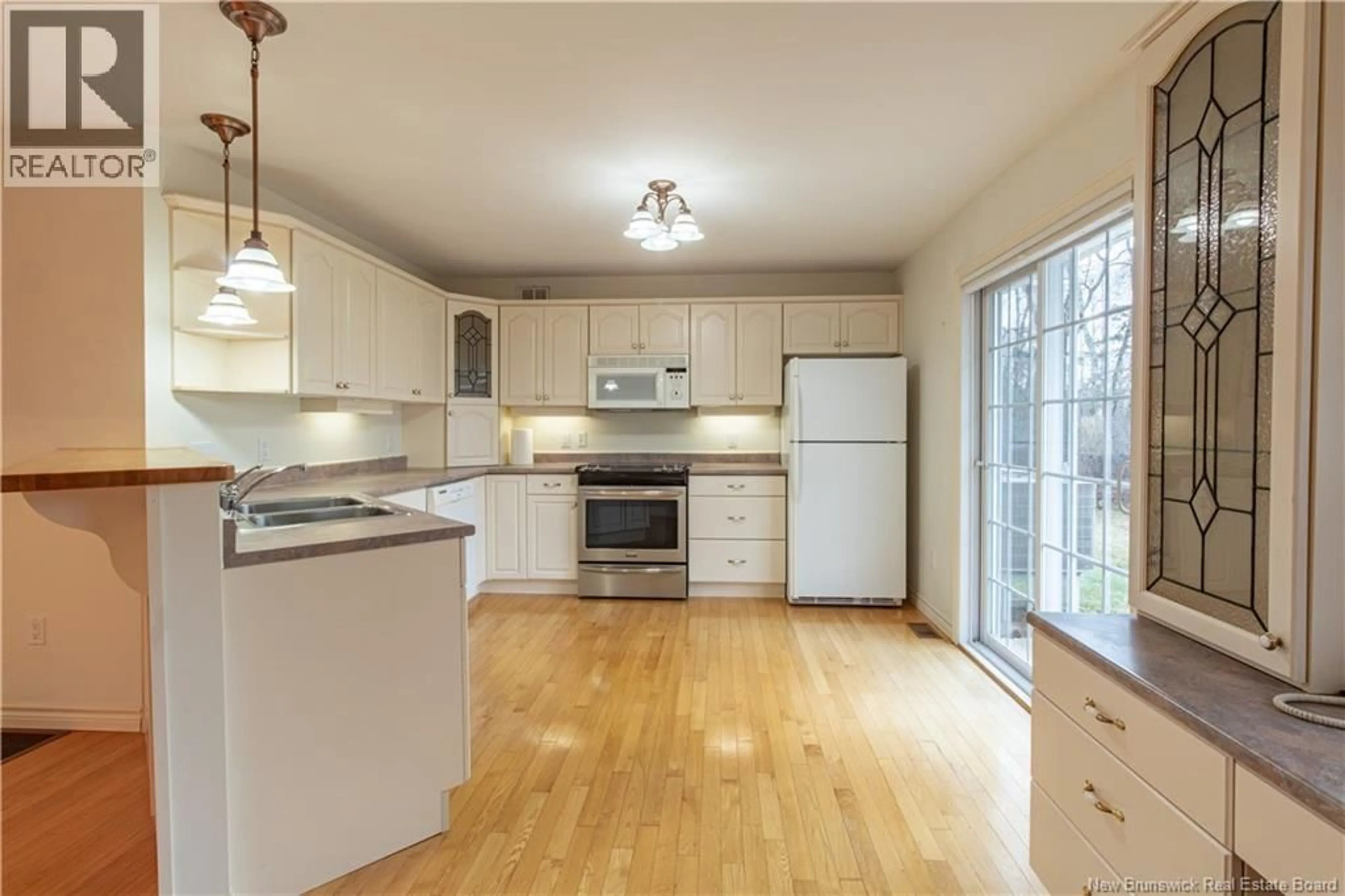 Open concept kitchen, wood/laminate floor for 131 BRYANT DRIVE, Sussex New Brunswick E4E5X1