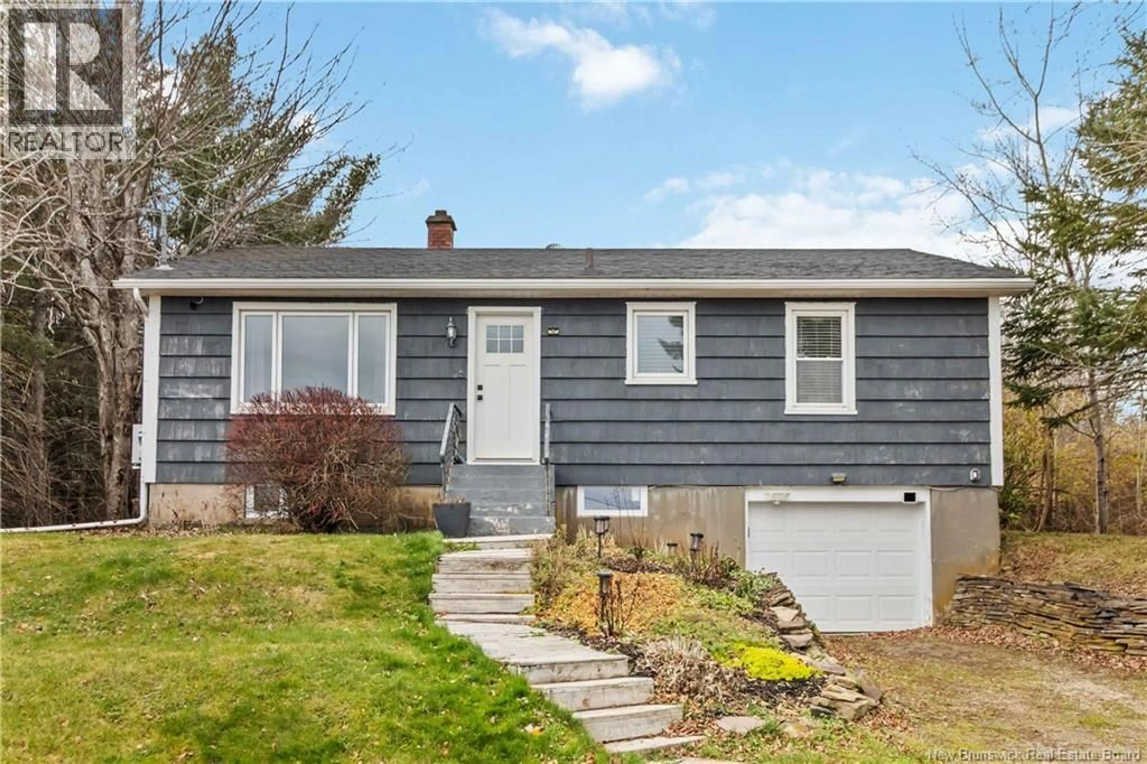 Home with vinyl exterior material, street for 1418 RTE 114, Lower Coverdale New Brunswick E1J1E1