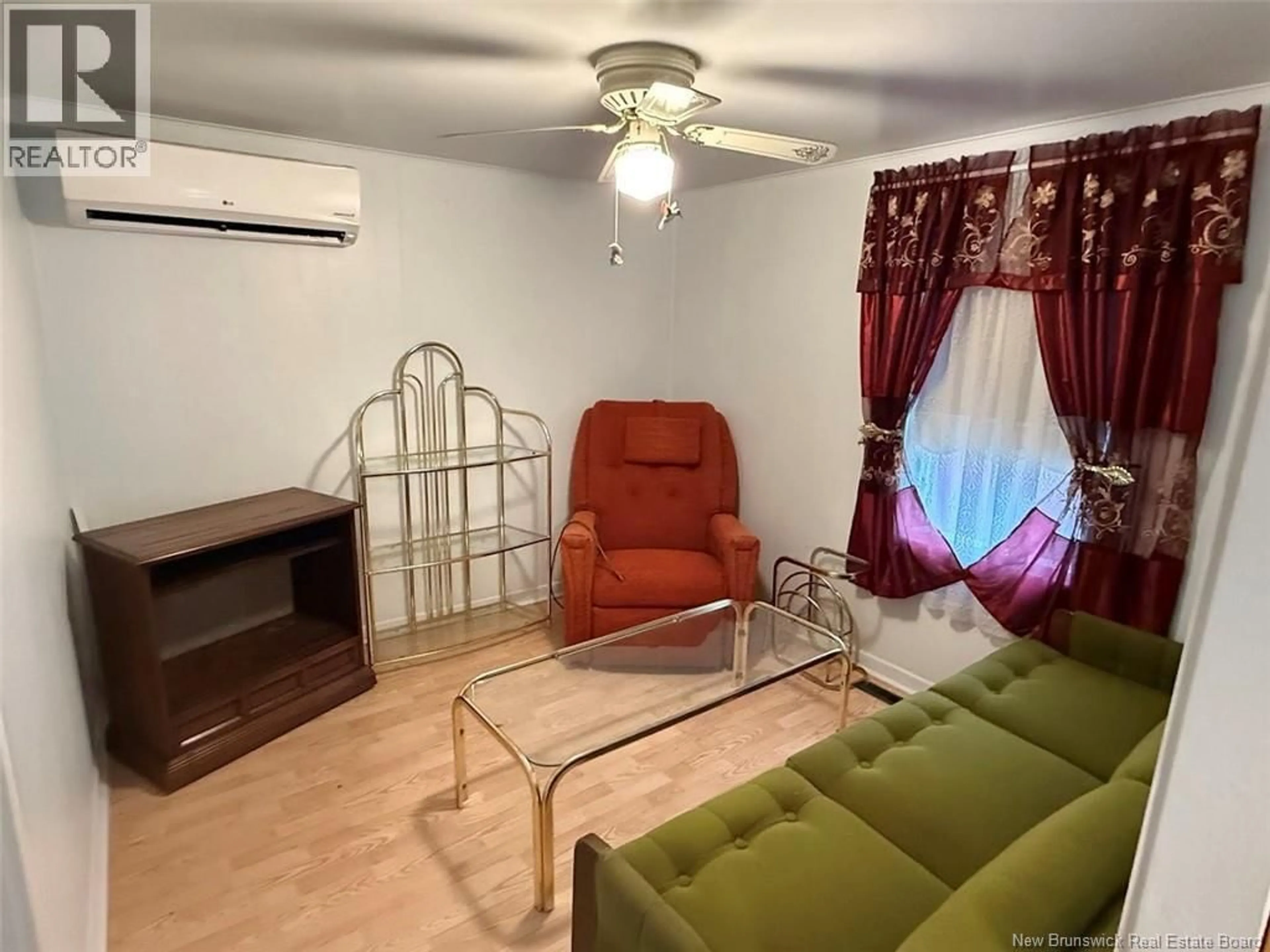 Living room with furniture, unknown for 60 IROQUOIS ROAD, Saint-Jacques New Brunswick E7B2B6