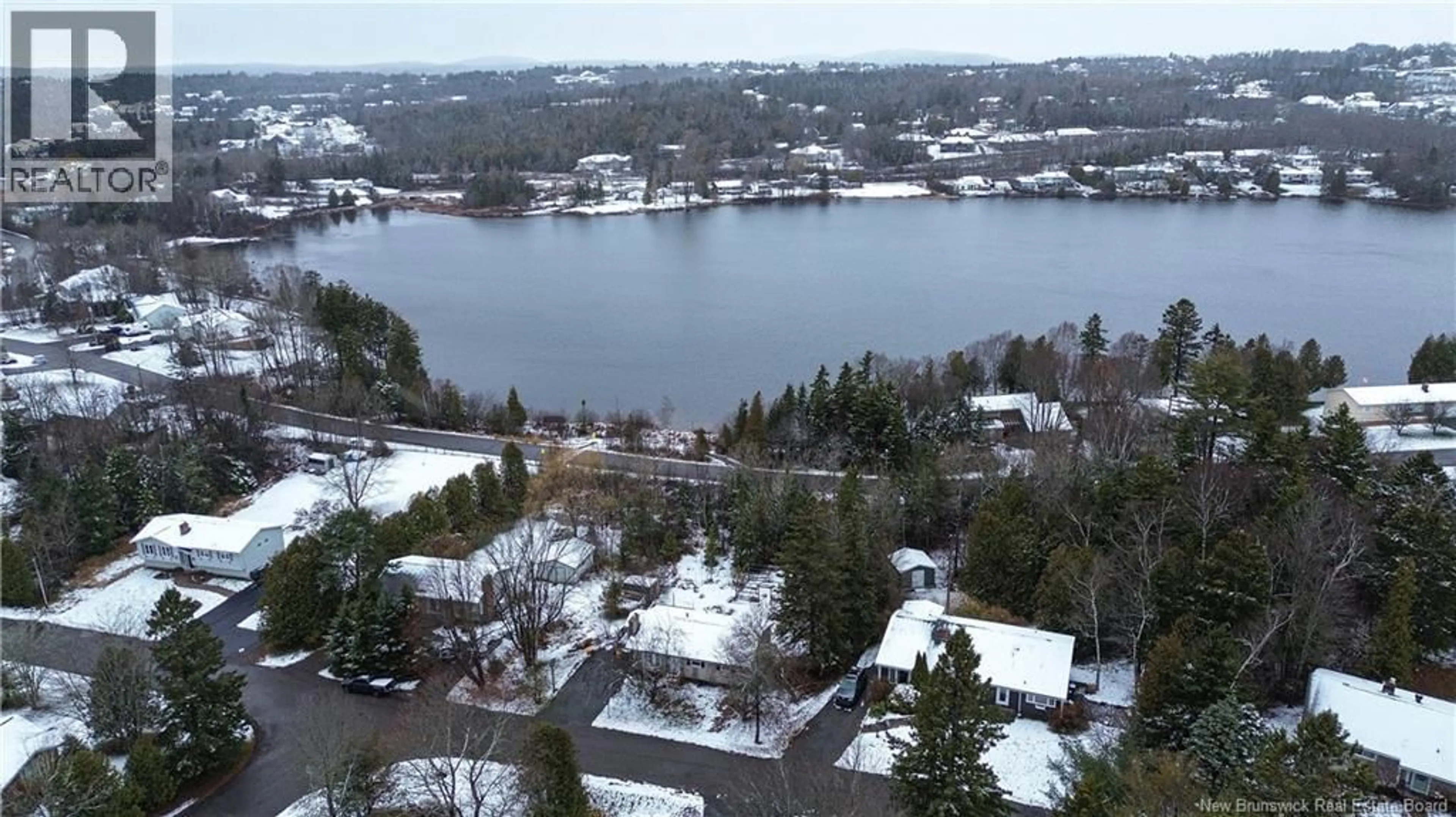 A pic from outside/outdoor area/front of a property/back of a property/a pic from drone, water/lake/river/ocean view for 38 LAKE ROAD, Quispamsis New Brunswick E2E4P9