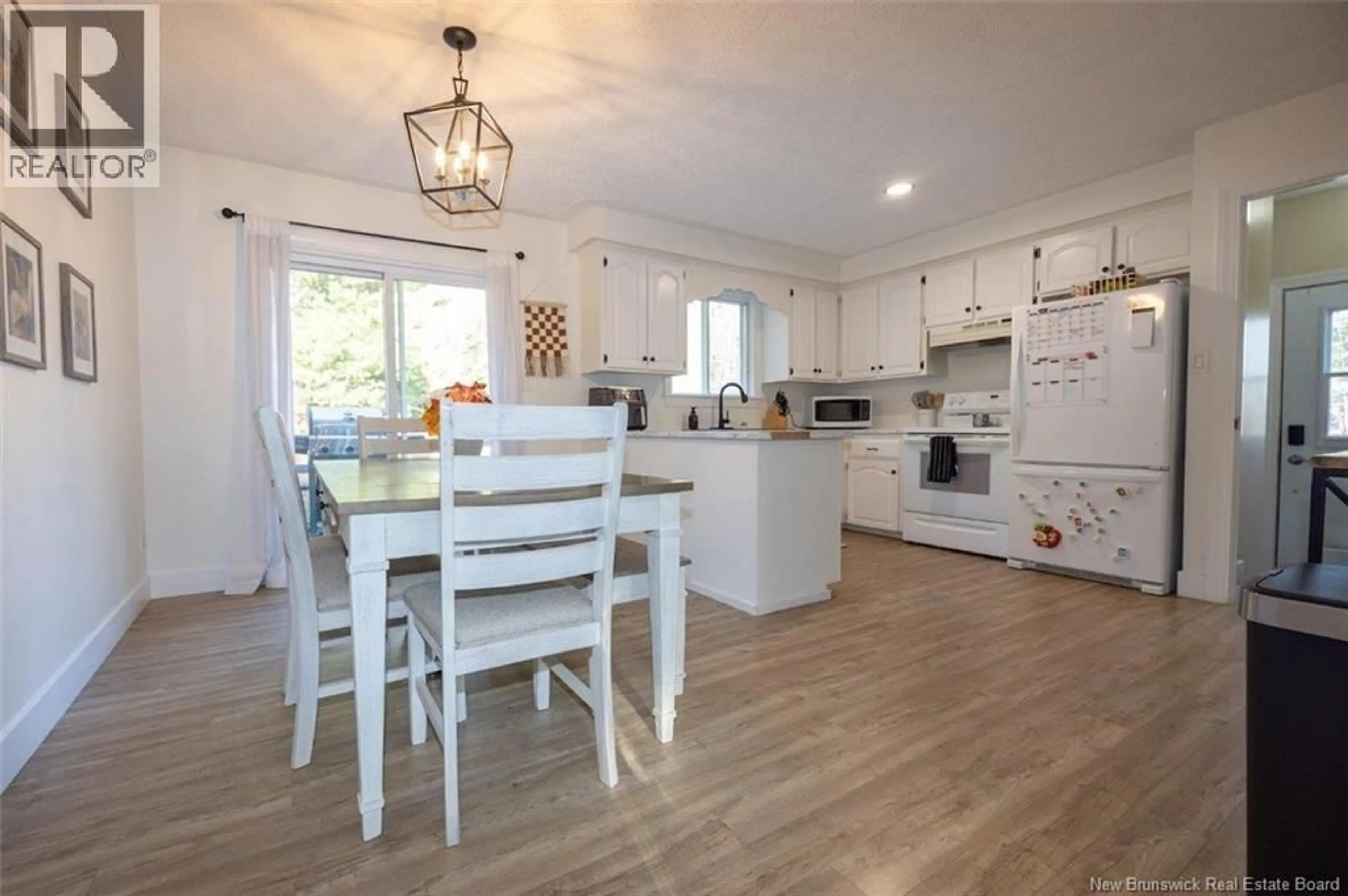 Open concept kitchen, wood/laminate floor for 72 LUDFORD LANE, Mazerolle Settlement New Brunswick E3E2A1