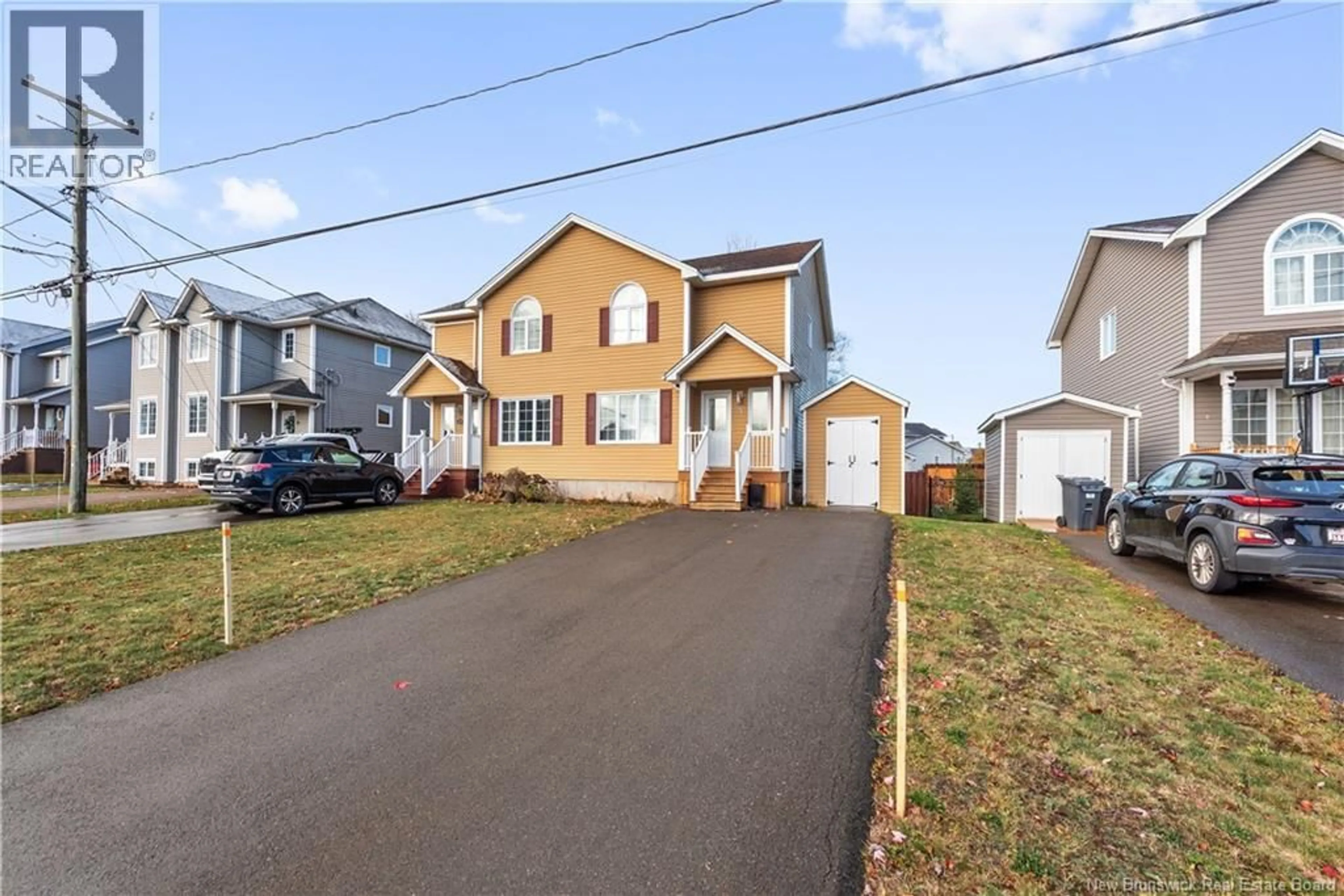 A pic from outside/outdoor area/front of a property/back of a property/a pic from drone, street for 25 HARMONY DRIVE, Riverview New Brunswick E1B0L6