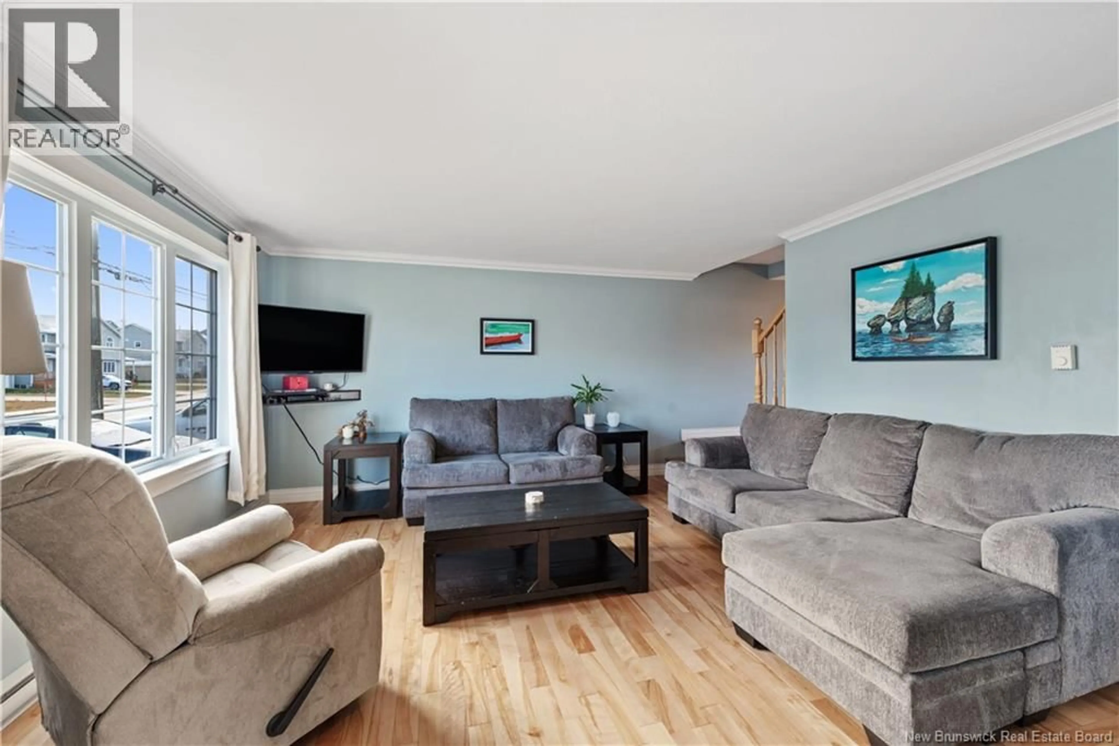 Living room with furniture, wood/laminate floor for 25 HARMONY DRIVE, Riverview New Brunswick E1B0L6
