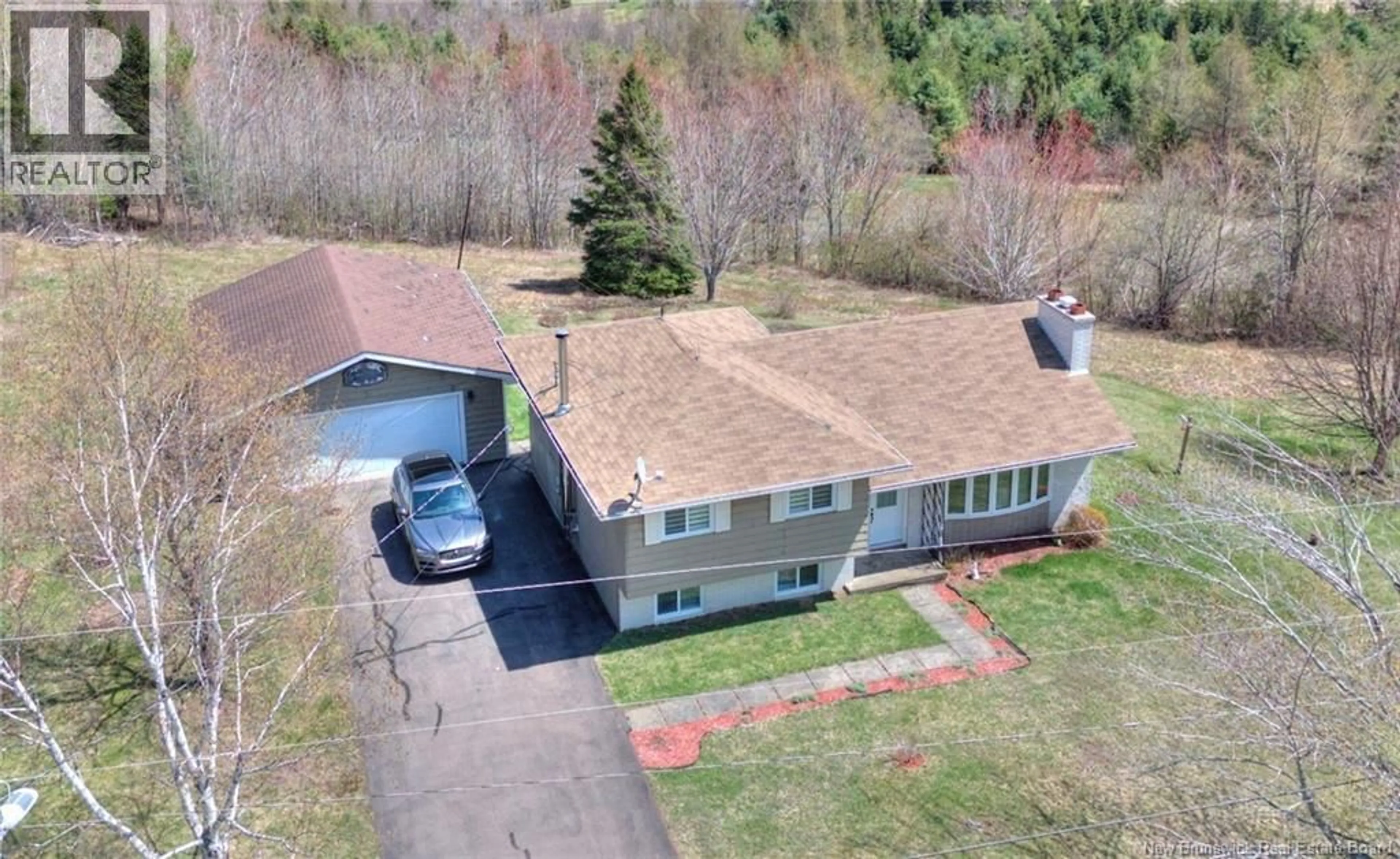 A pic from outside/outdoor area/front of a property/back of a property/a pic from drone, street for 3228 ROUTE 465, Beersville New Brunswick E4T2P7