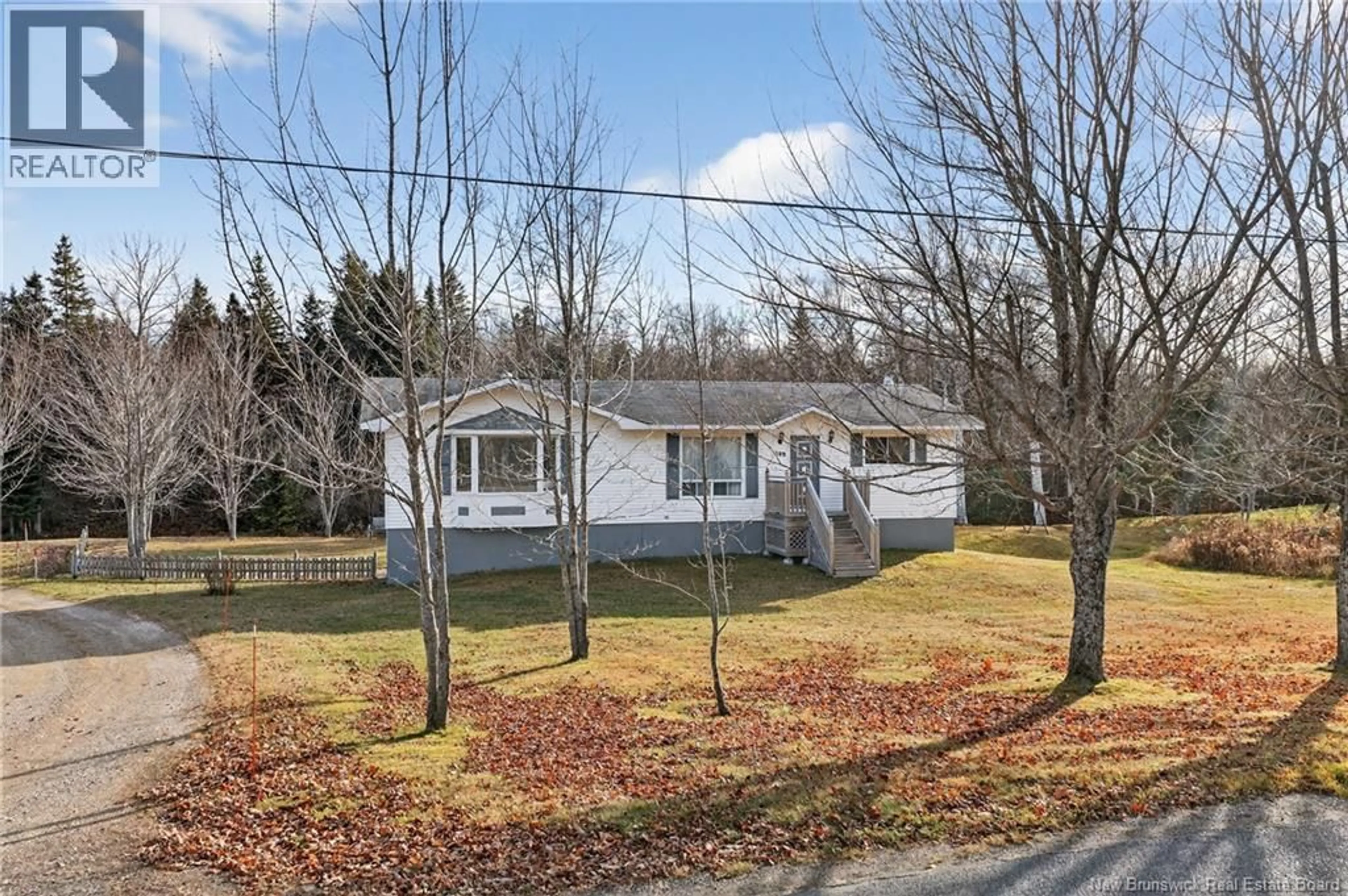 A pic from outside/outdoor area/front of a property/back of a property/a pic from drone, street for 309 MORRISON, Beresford New Brunswick E8K2H8