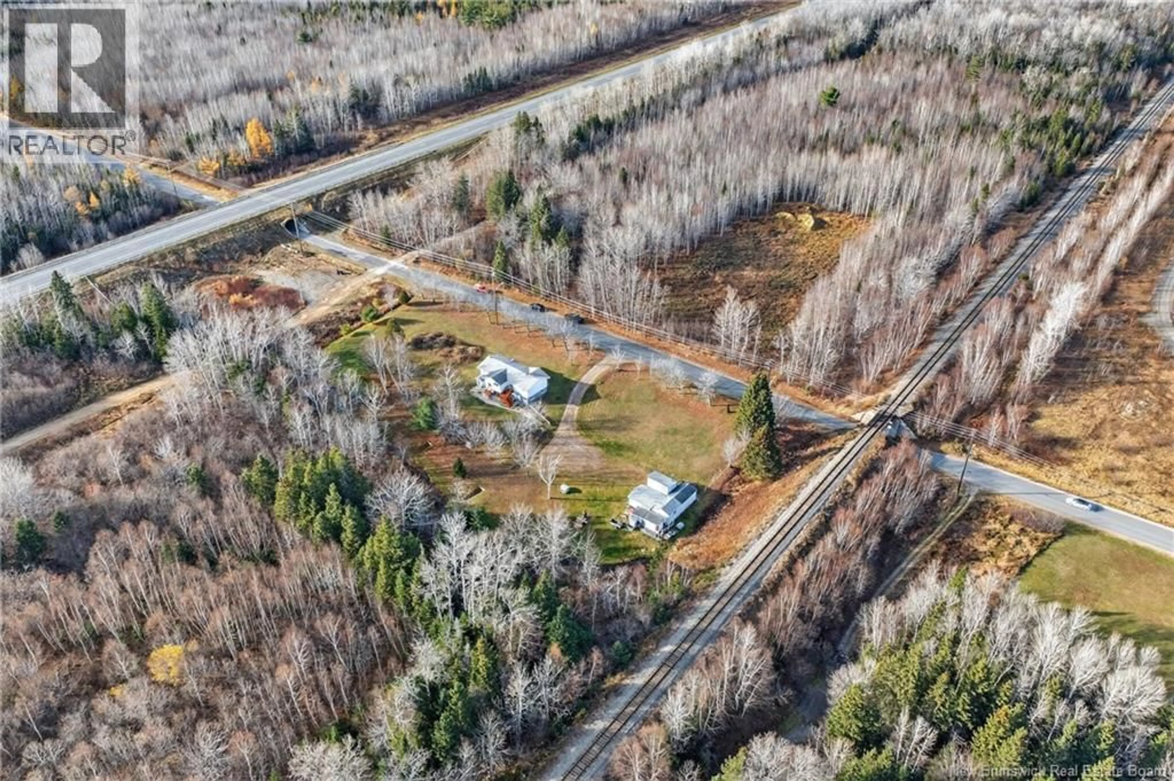 A pic from outside/outdoor area/front of a property/back of a property/a pic from drone, unknown for 309 MORRISON, Beresford New Brunswick E8K2H8