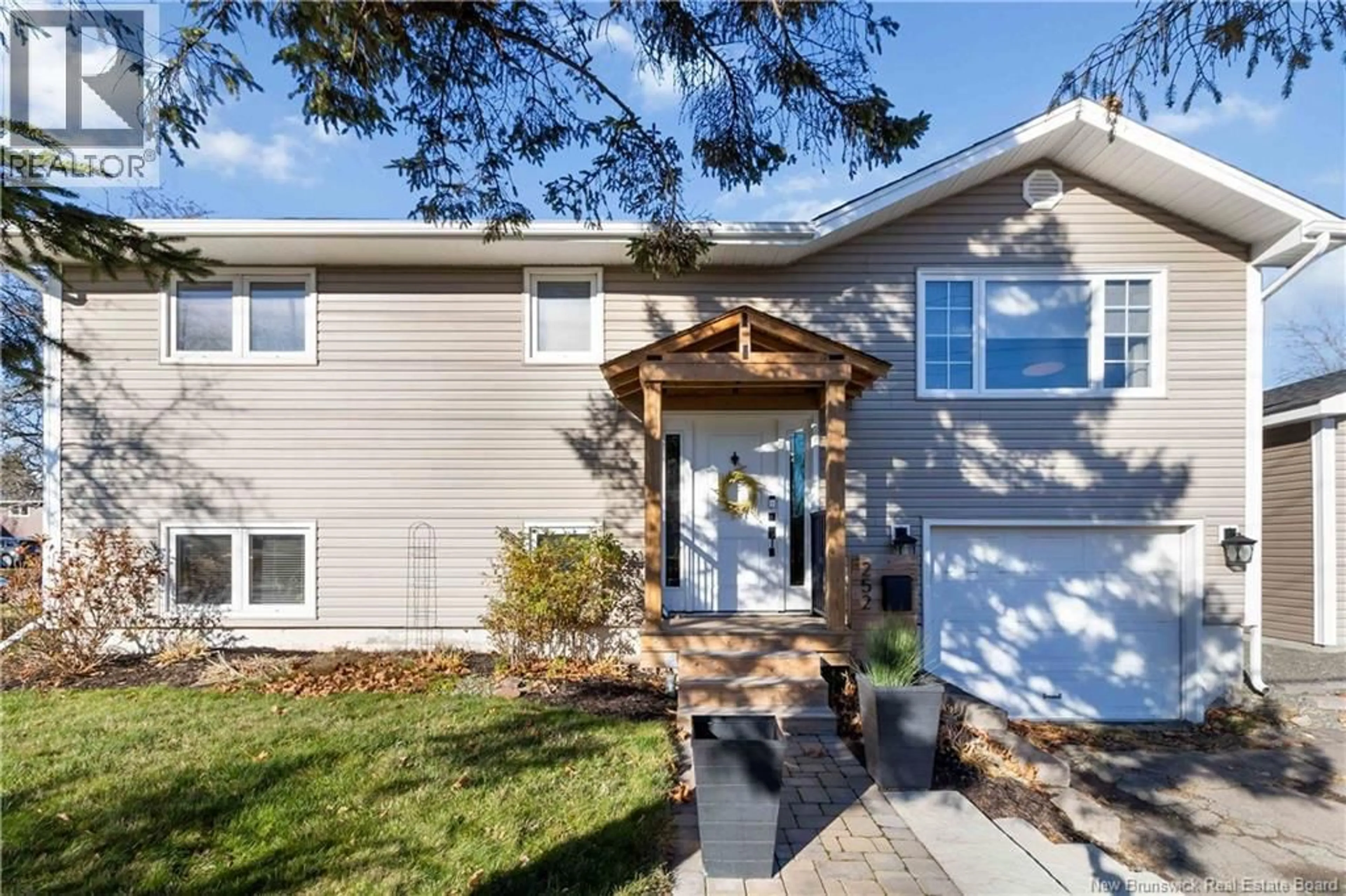 Home with vinyl exterior material, street for 252 WHITEPINE ROAD, Riverview New Brunswick E1B2X3