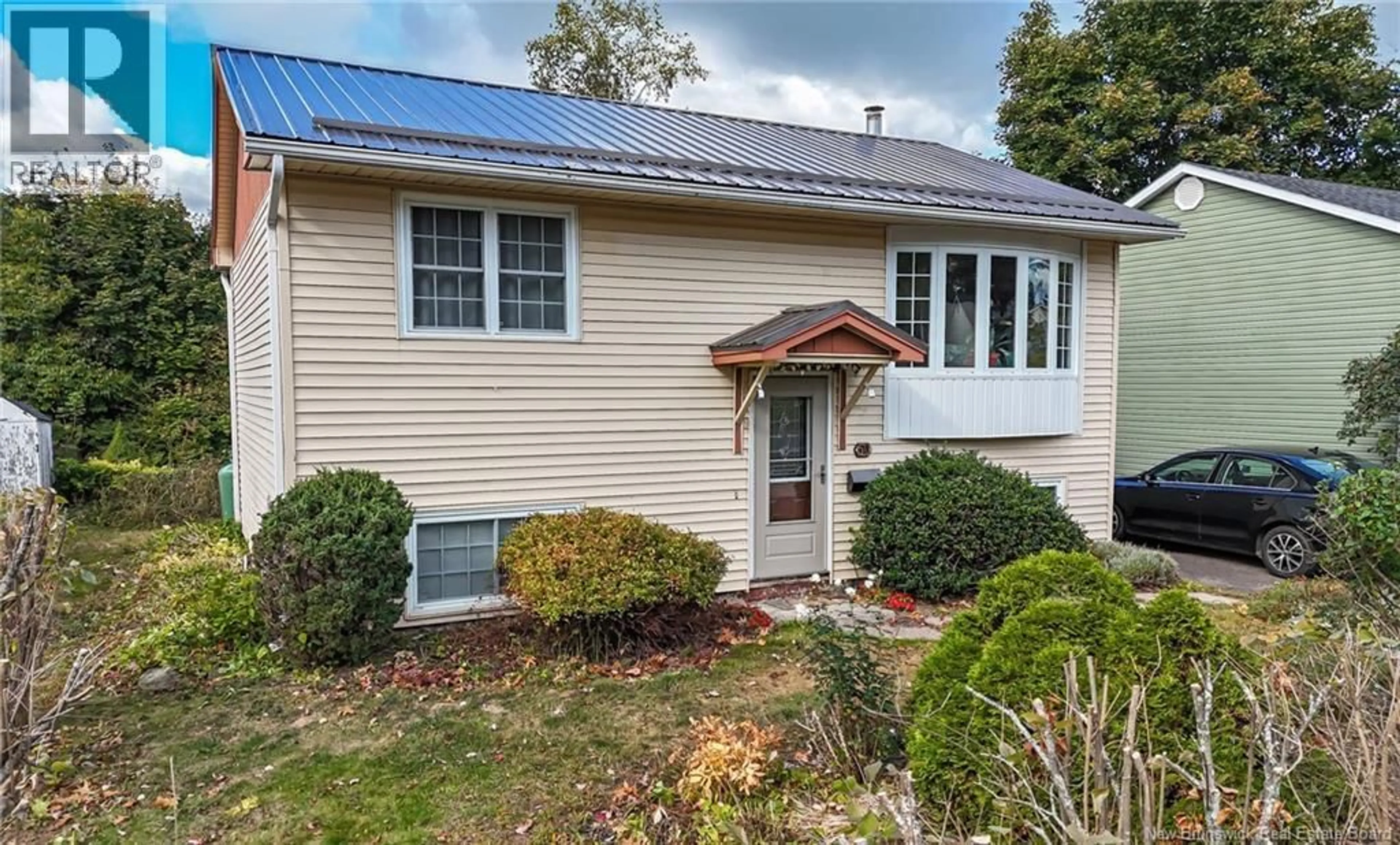 Home with vinyl exterior material, street for 50 LILAC CRESCENT, Fredericton New Brunswick E3A2G9