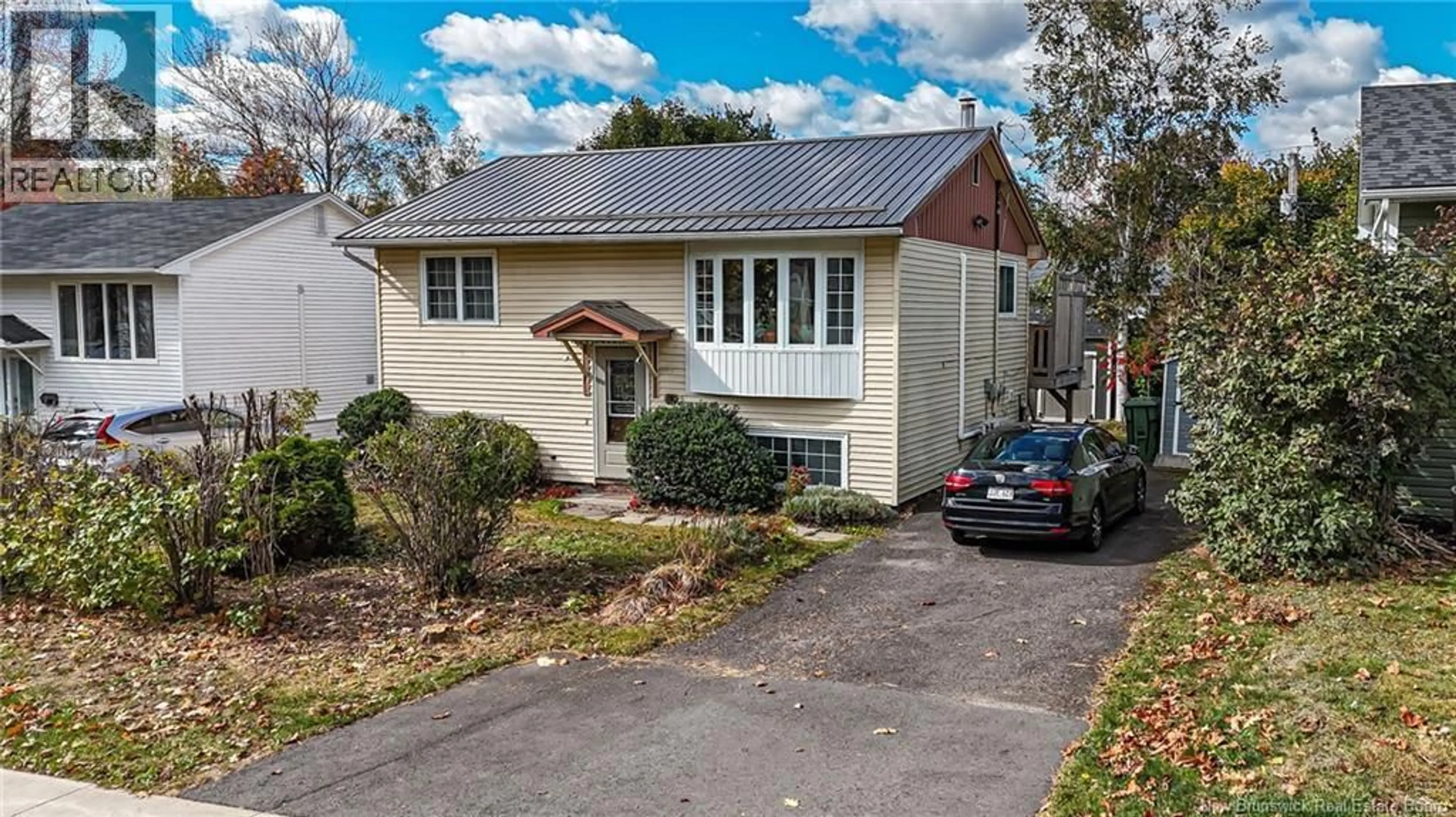 Home with vinyl exterior material, street for 50 LILAC CRESCENT, Fredericton New Brunswick E3A2G9