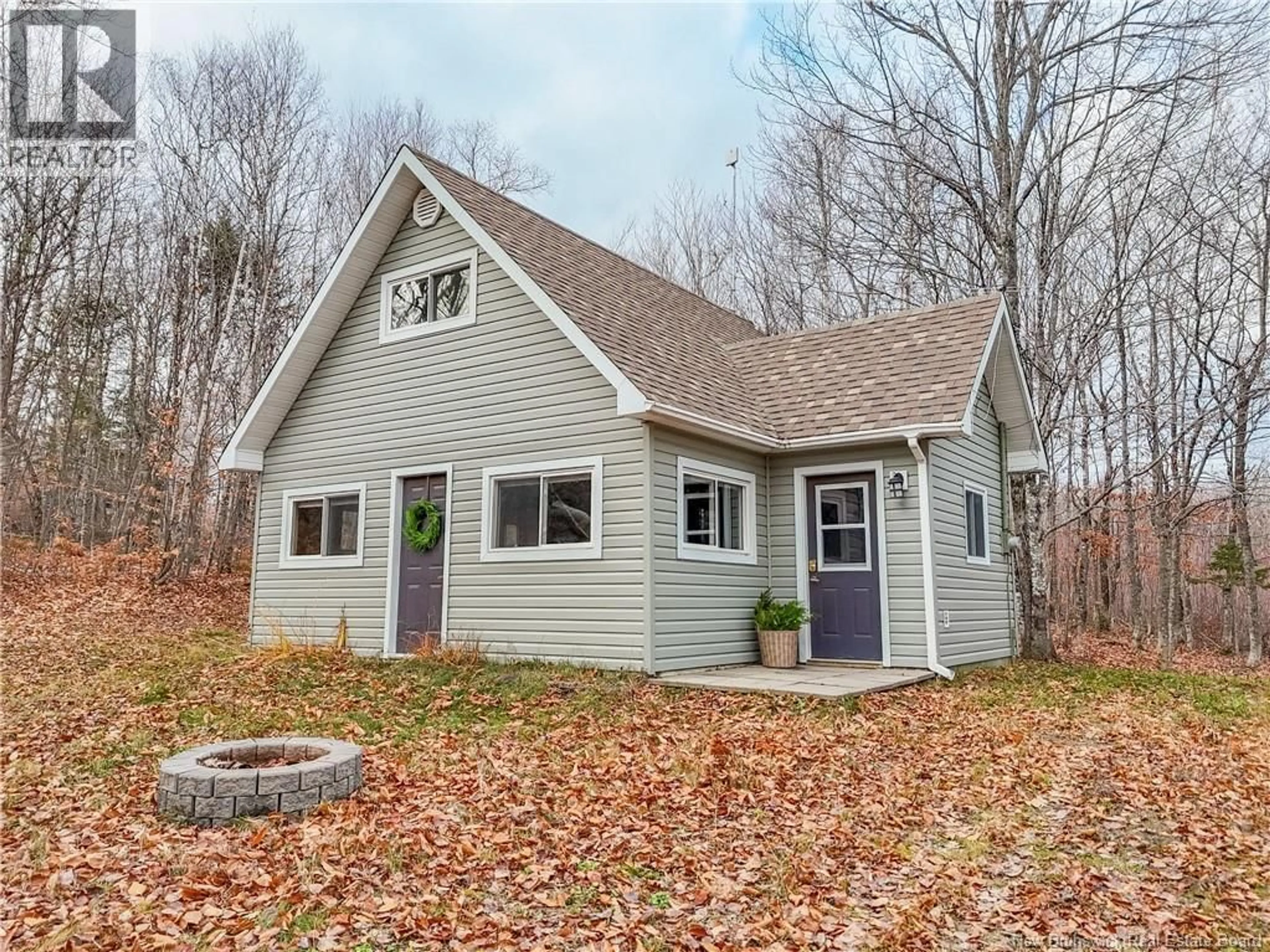 Home with vinyl exterior material, street for 40 SKIERS LANE, Central Hainesville New Brunswick E6E2K2