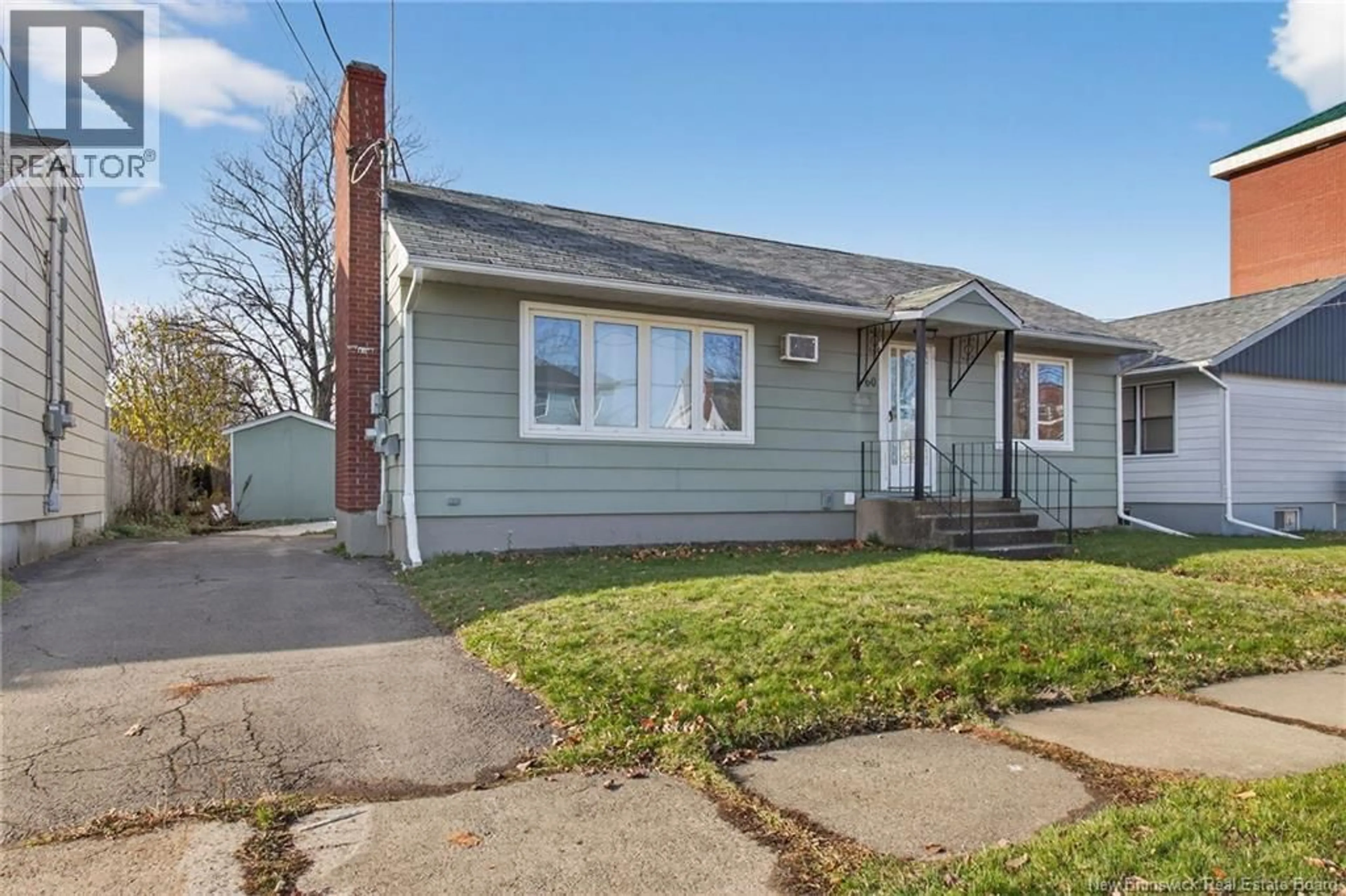 Home with vinyl exterior material, street for 60 BELMONT STREET, Moncton New Brunswick E1C6X6