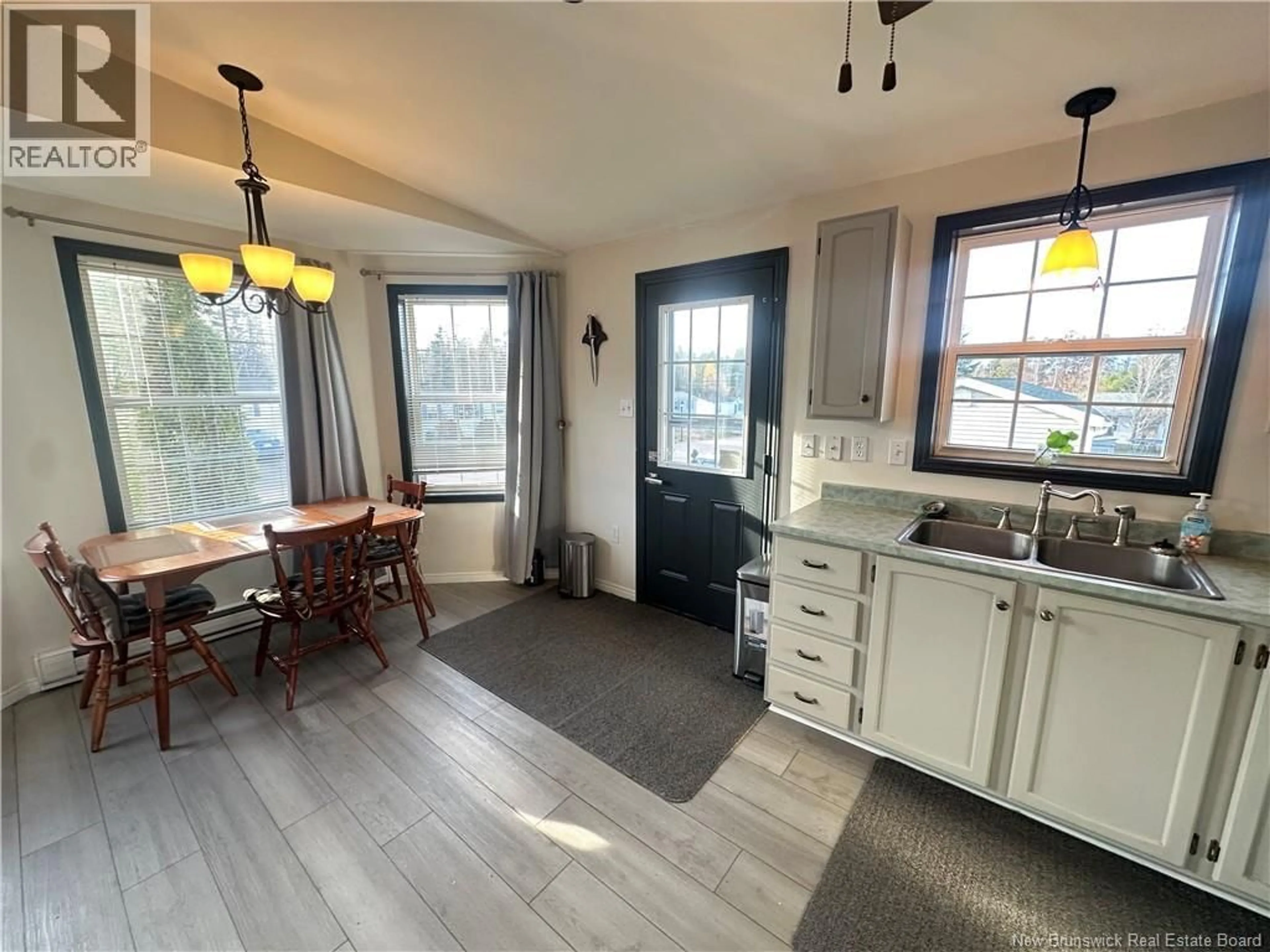 Open concept kitchen, wood/laminate floor for 1 CONVERSE LANE, Riverview New Brunswick E1B5J3