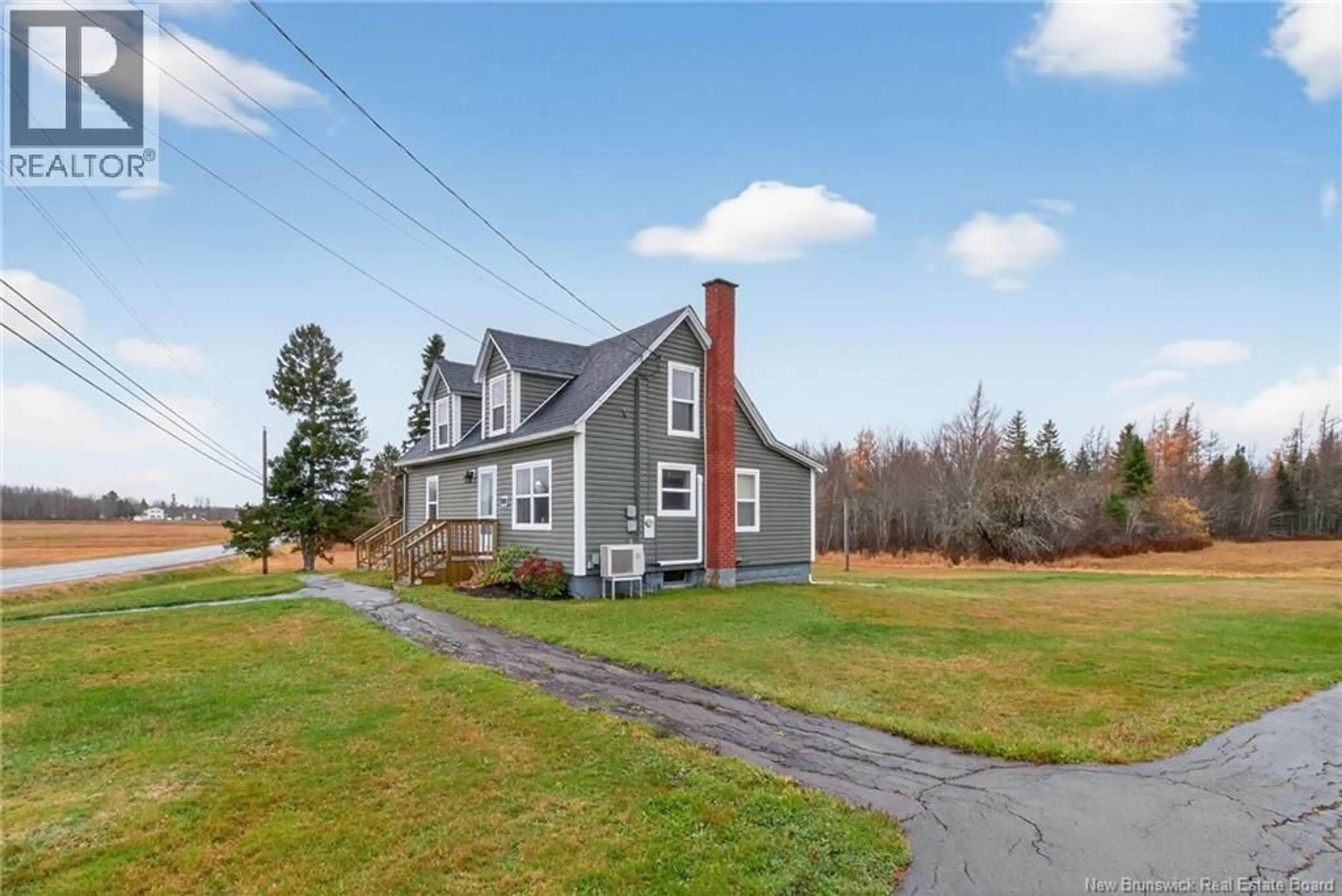 Home with vinyl exterior material, street for 1113 RTE 933, Haute-Aboujagane New Brunswick E4P5R3