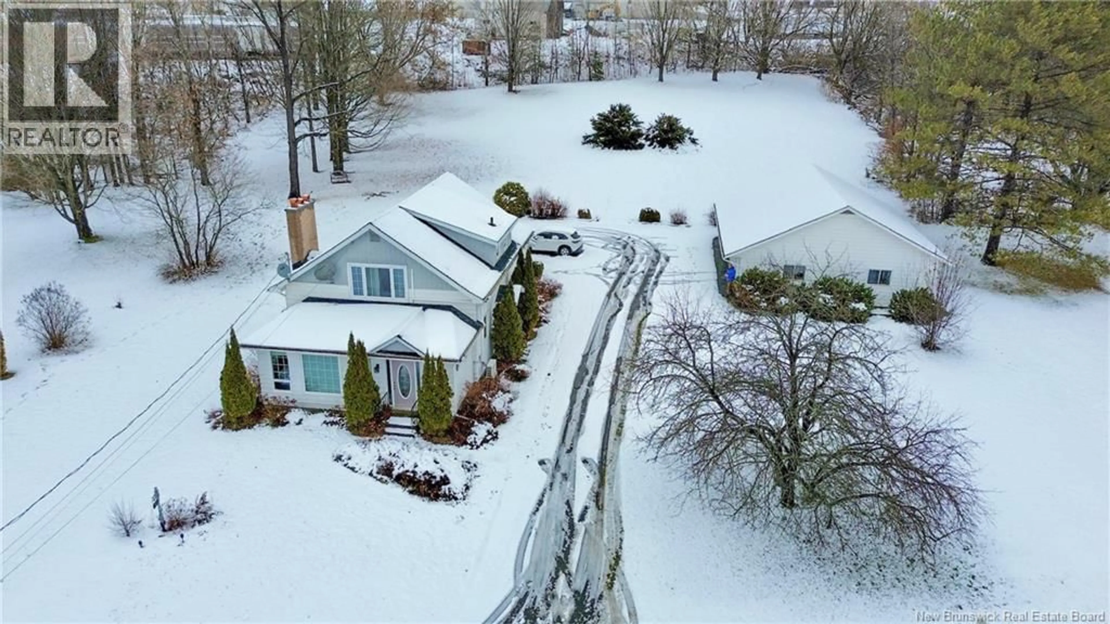 A pic from outside/outdoor area/front of a property/back of a property/a pic from drone, street for 58 HIGH STREET, Hartland New Brunswick E7P2L2