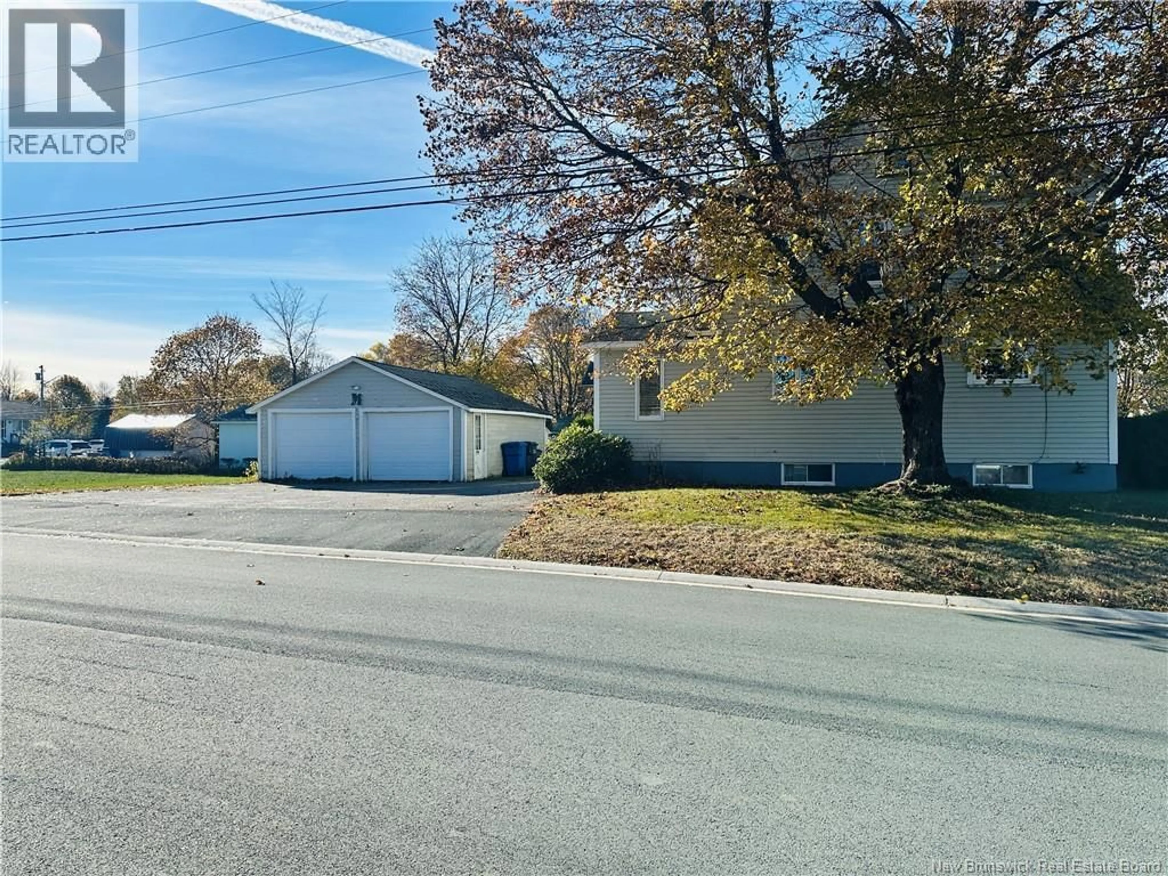 A pic from outside/outdoor area/front of a property/back of a property/a pic from drone, street for 84 HOWARD STREET, Miramichi New Brunswick E1N1V8