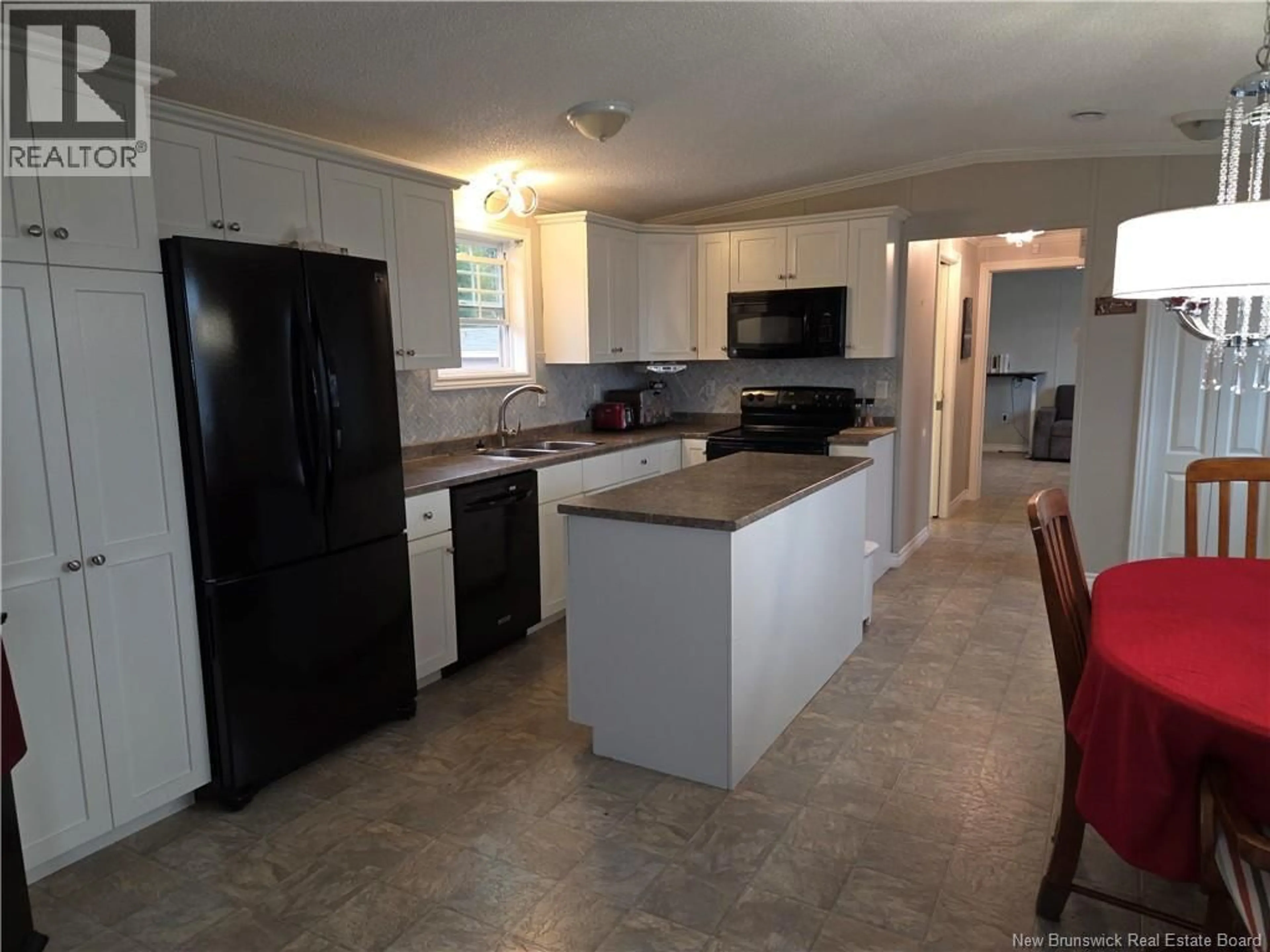 Open concept kitchen, ceramic/tile floor for 201 BONAVENTURE, Shediac New Brunswick E4P0G9