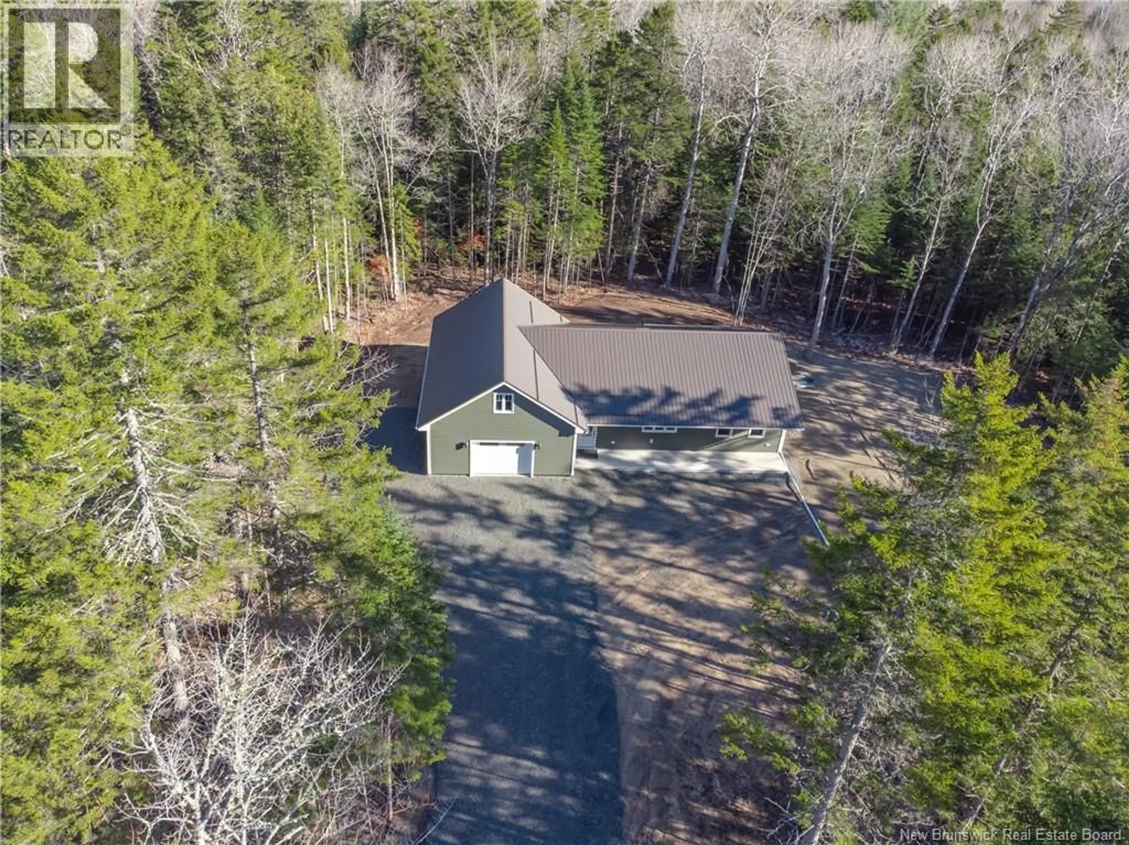 A pic from outside/outdoor area/front of a property/back of a property/a pic from drone, forest/trees view for 25-1 DONNYS WAY, Charters Settlement New Brunswick E3C1X7