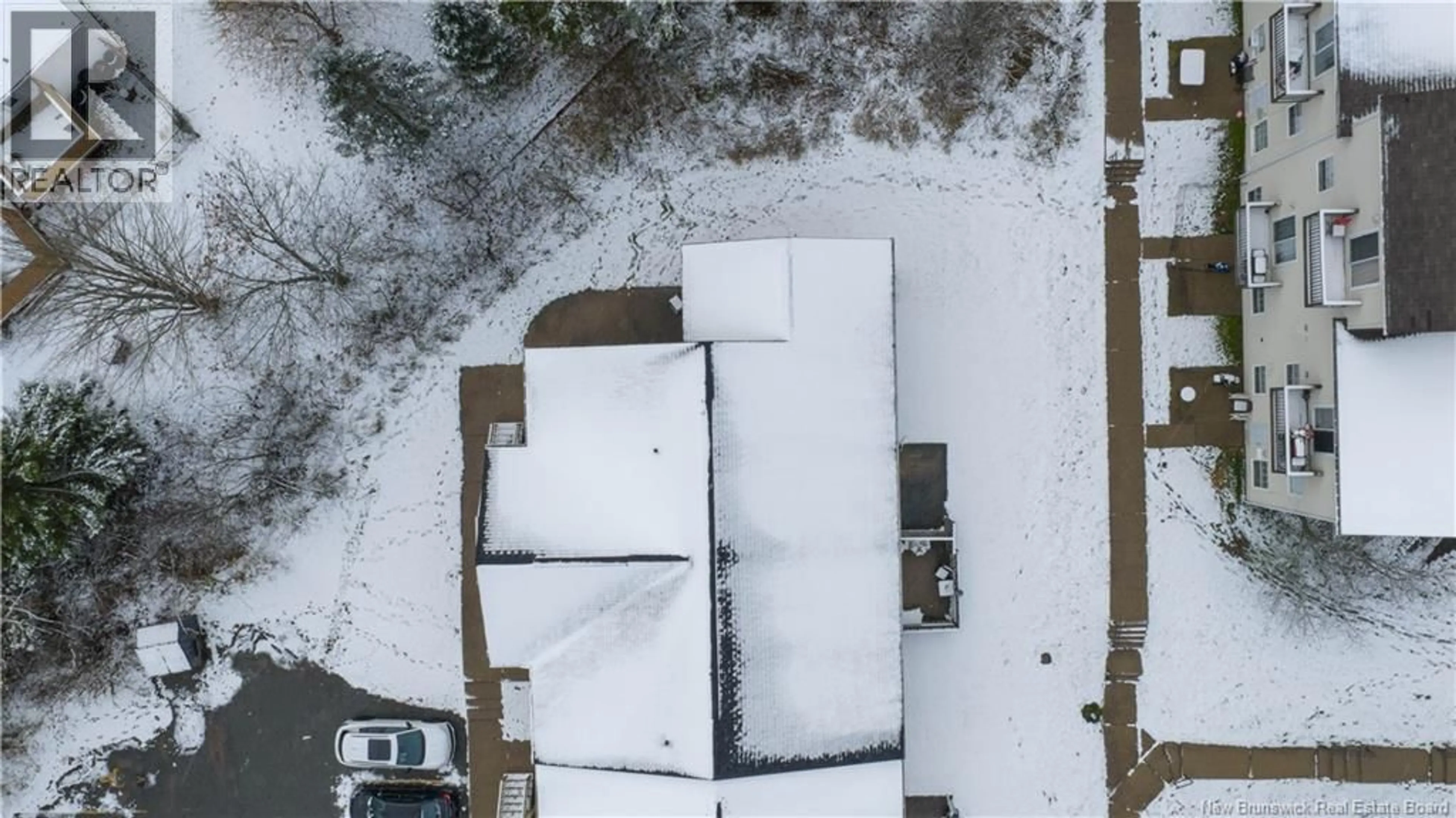 A pic from outside/outdoor area/front of a property/back of a property/a pic from drone, street for 101 - 50 DOWNSVIEW DRIVE, Saint John New Brunswick E2M5S6