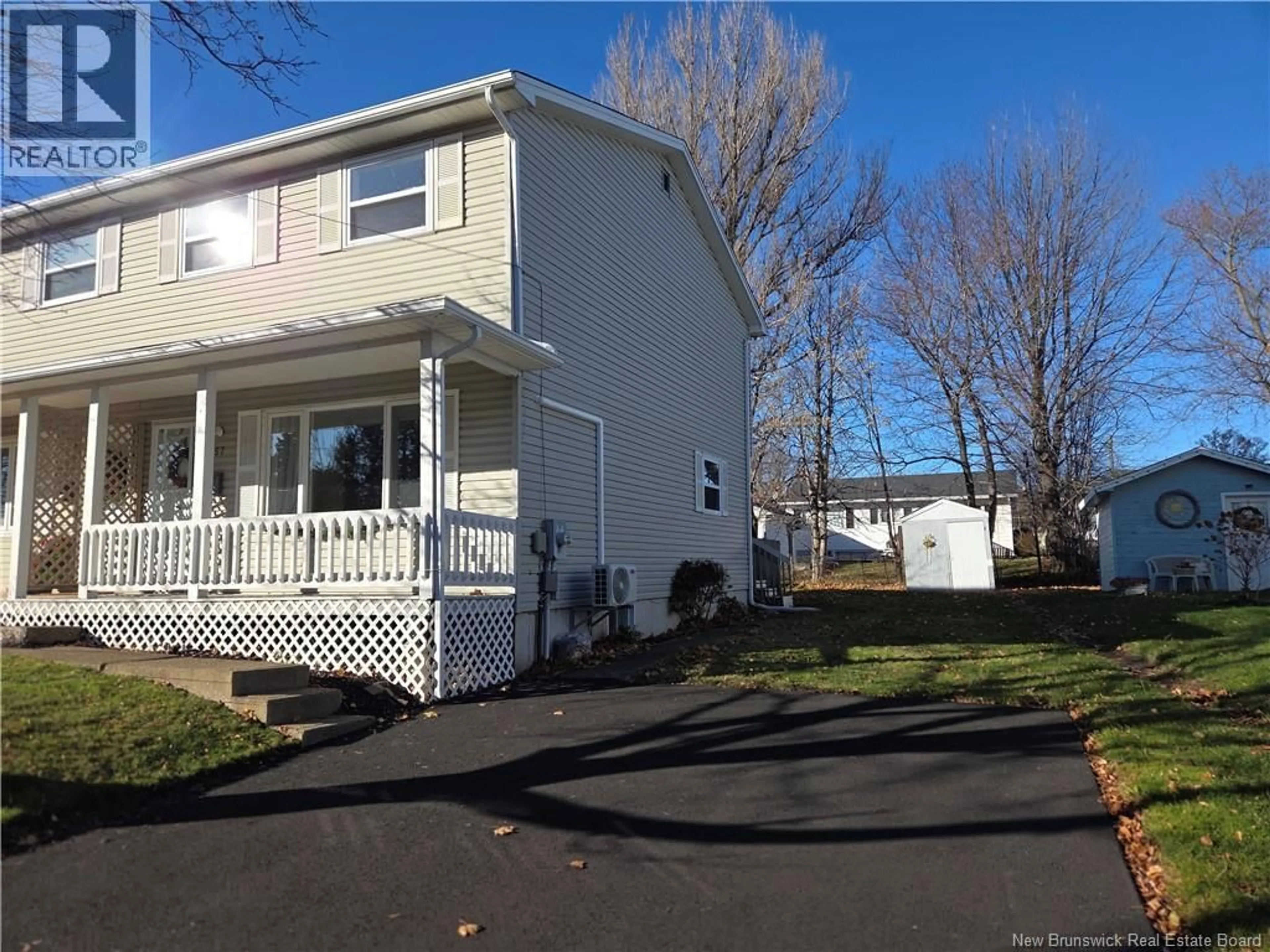 Home with vinyl exterior material, street for 57 BROOKSIDE DRIVE, Moncton New Brunswick E1E4K4