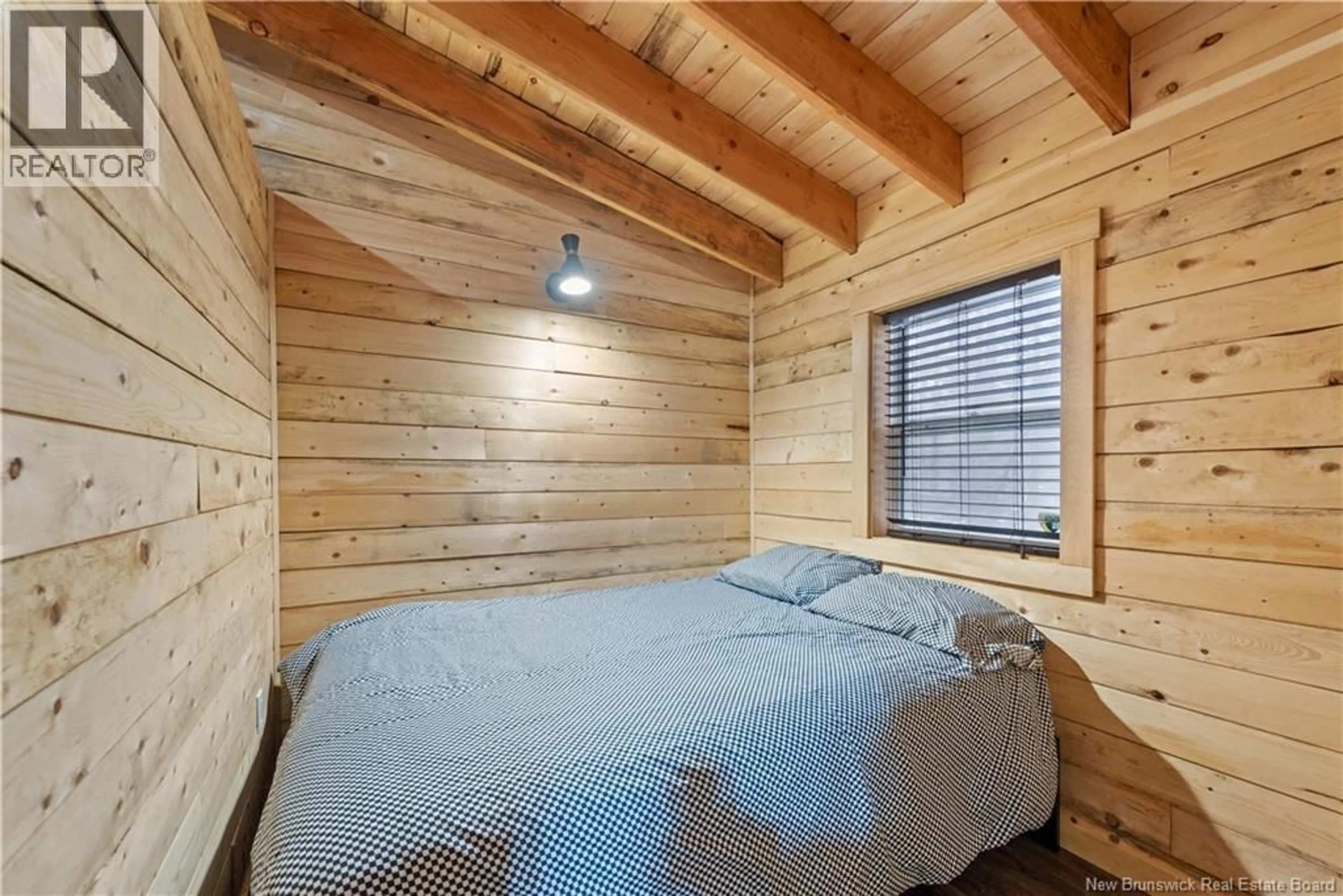 Bedroom with bed, wood/laminate floor for CAMP ROUTE LAVALLEE, Memramcook New Brunswick E4K3C5