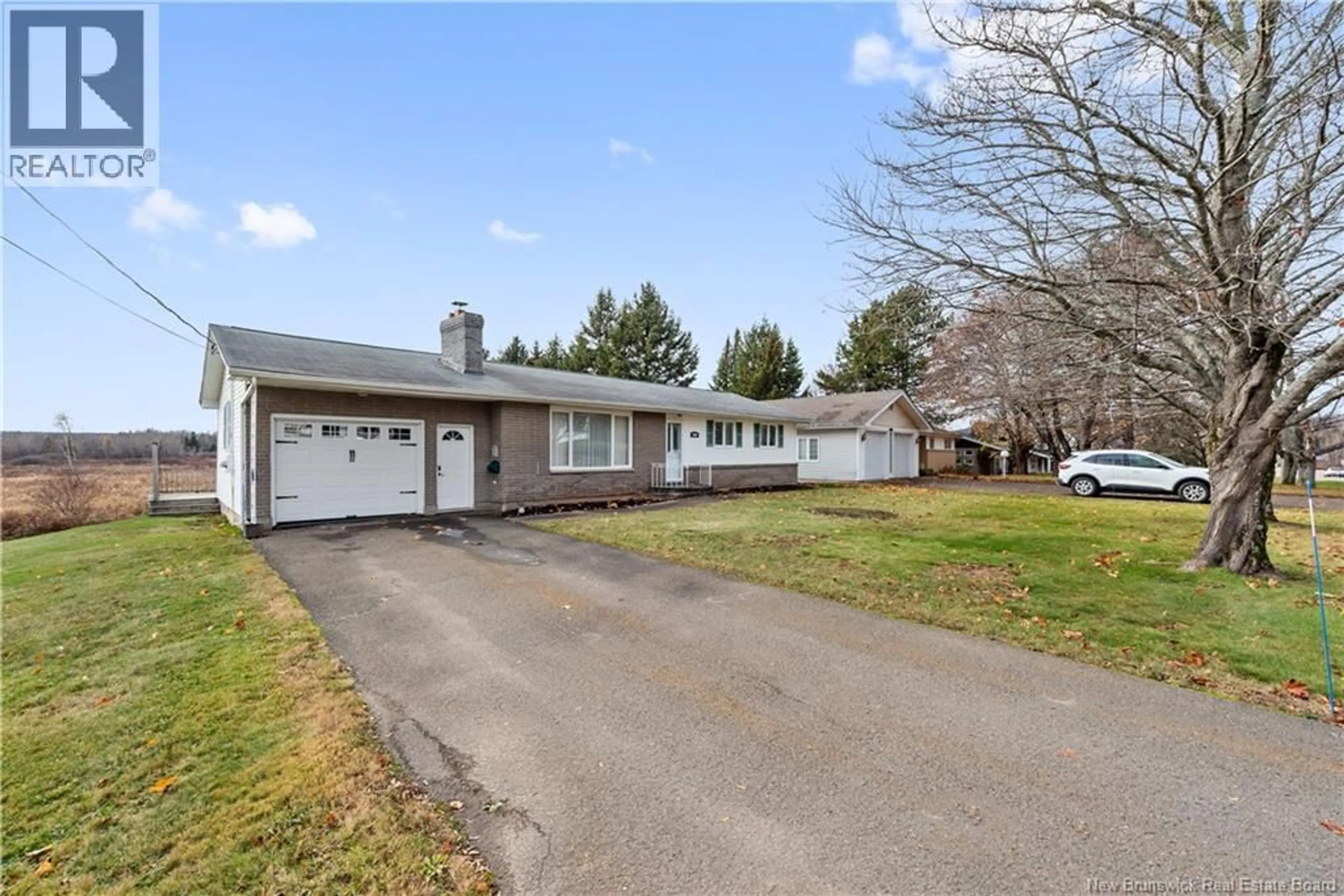 A pic from outside/outdoor area/front of a property/back of a property/a pic from drone, street for 1803 AMIRAULT, Dieppe New Brunswick E1A7J7