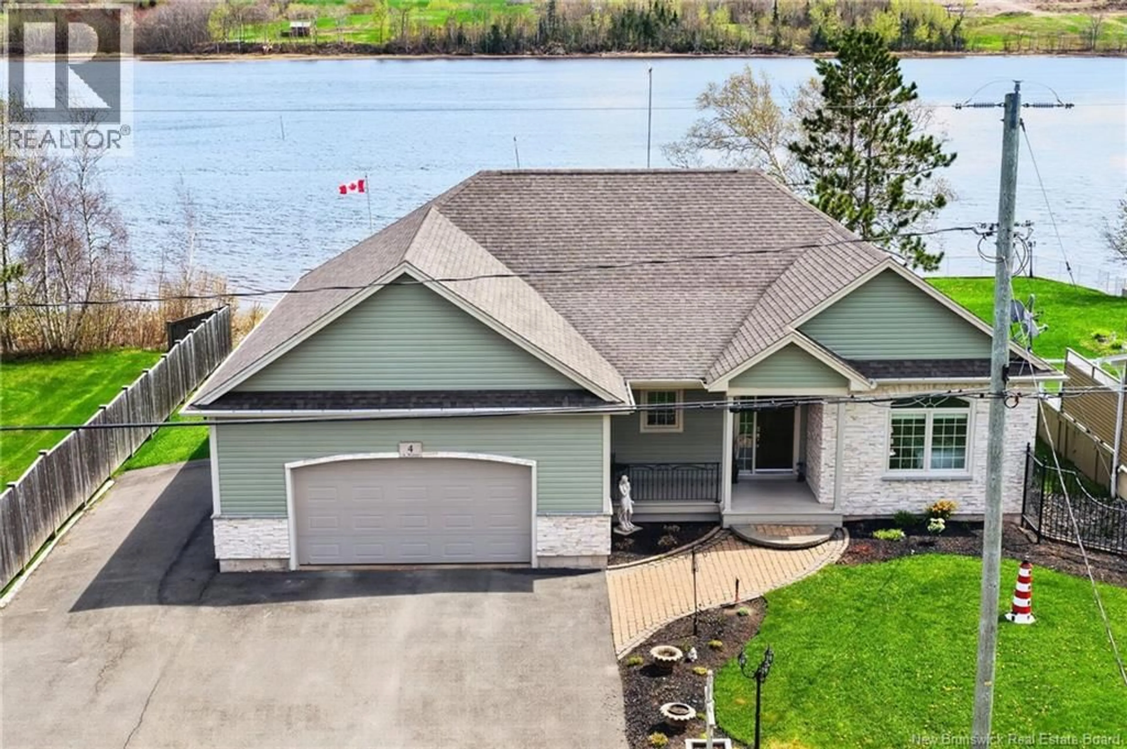 A pic from outside/outdoor area/front of a property/back of a property/a pic from drone, water/lake/river/ocean view for 4 HILAIRE STREET, Sainte-Marie-De-Kent New Brunswick E4S1V9