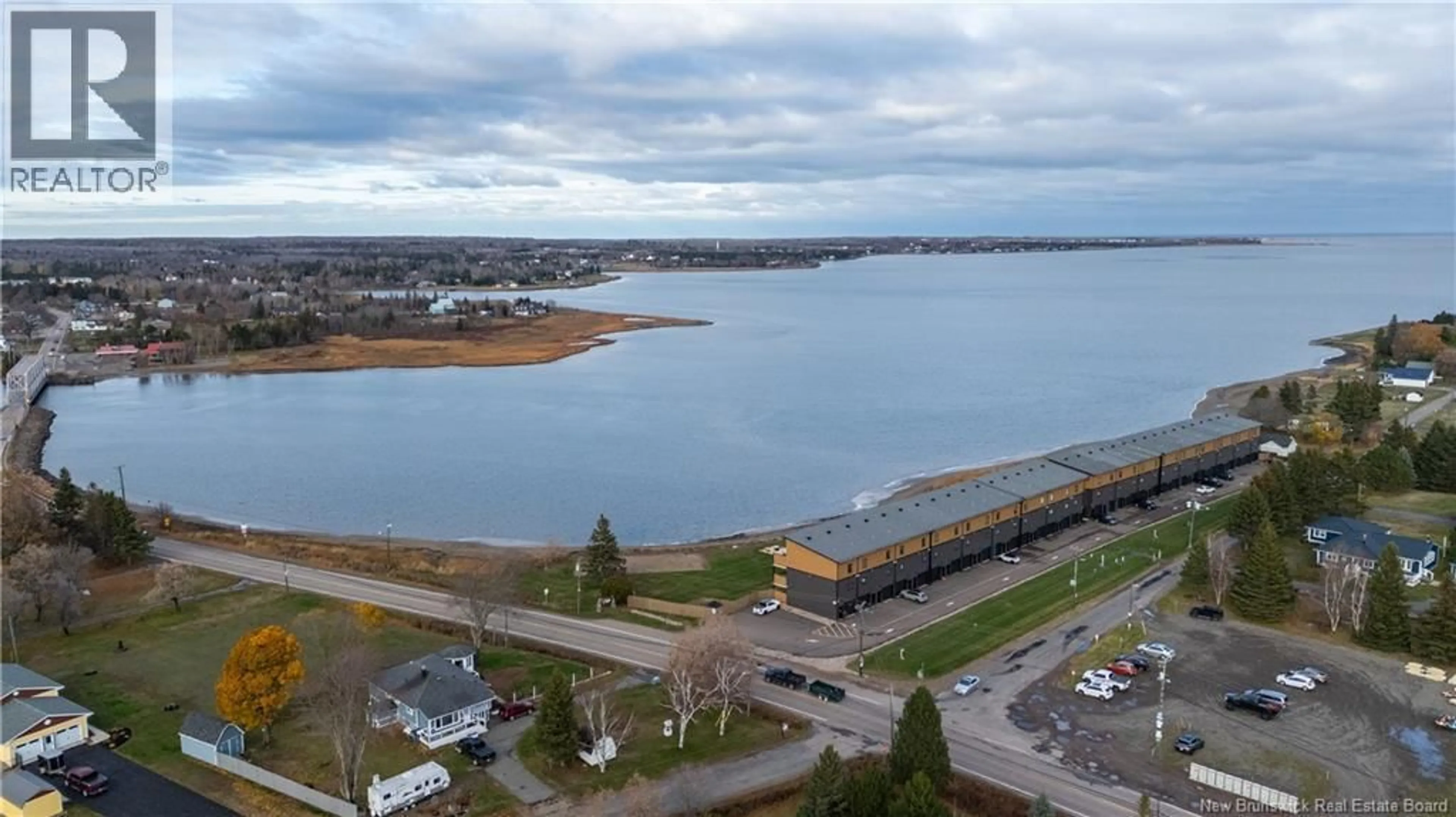 A pic from outside/outdoor area/front of a property/back of a property/a pic from drone, water/lake/river/ocean view for 132 - 3808 ROUTE 134, Shediac Bridge New Brunswick E4R1T5
